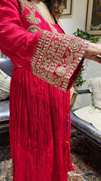 A Beautiful Red Silk Jacket Outfit With Heavy Hand Embroidery on it and With Wrinkled Silk Top and Bottom