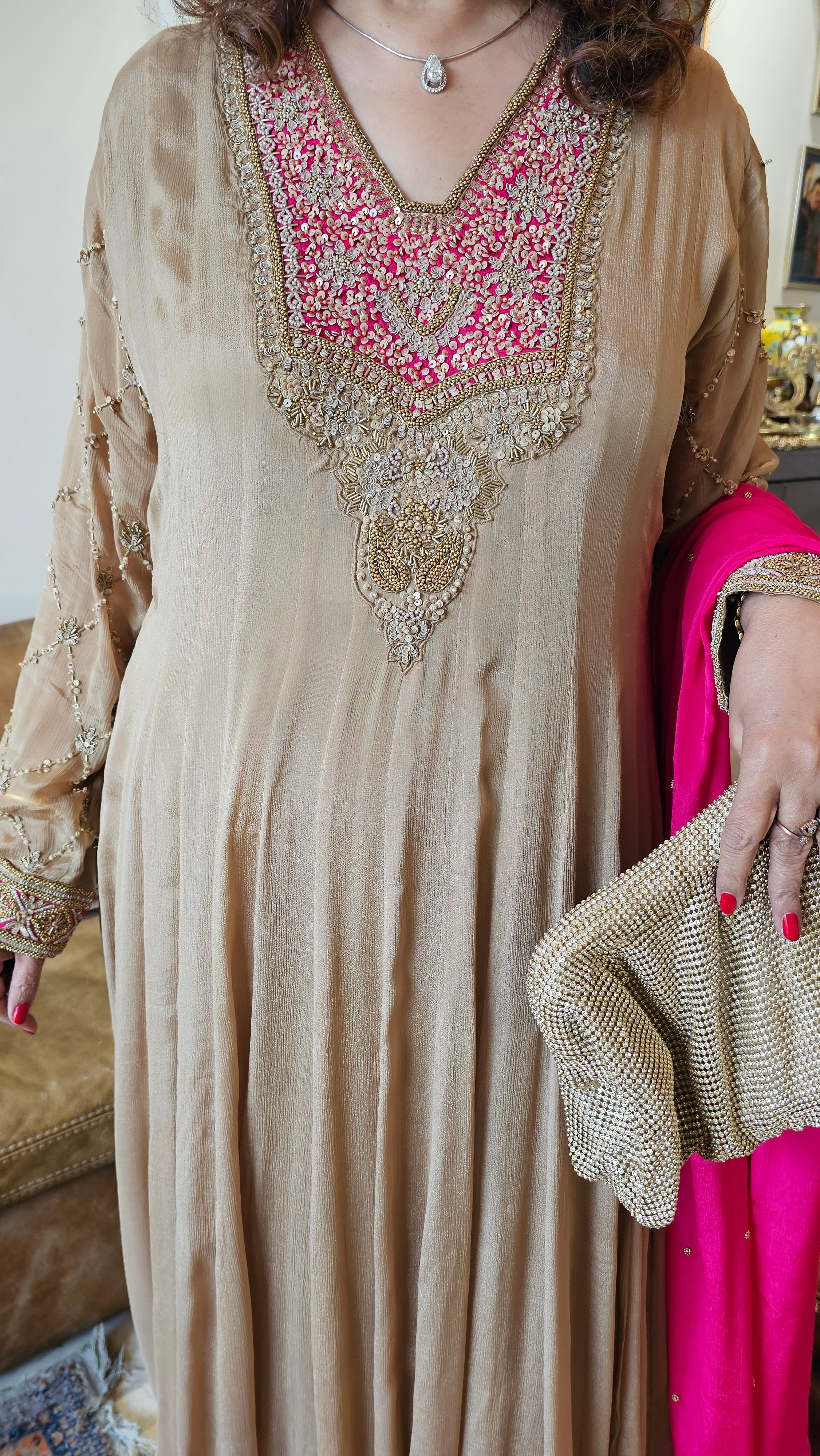 A Royal Full Length One Piece Dress With A Embroidered Dupatta & Hand Embellished Sleeves and Neck Line