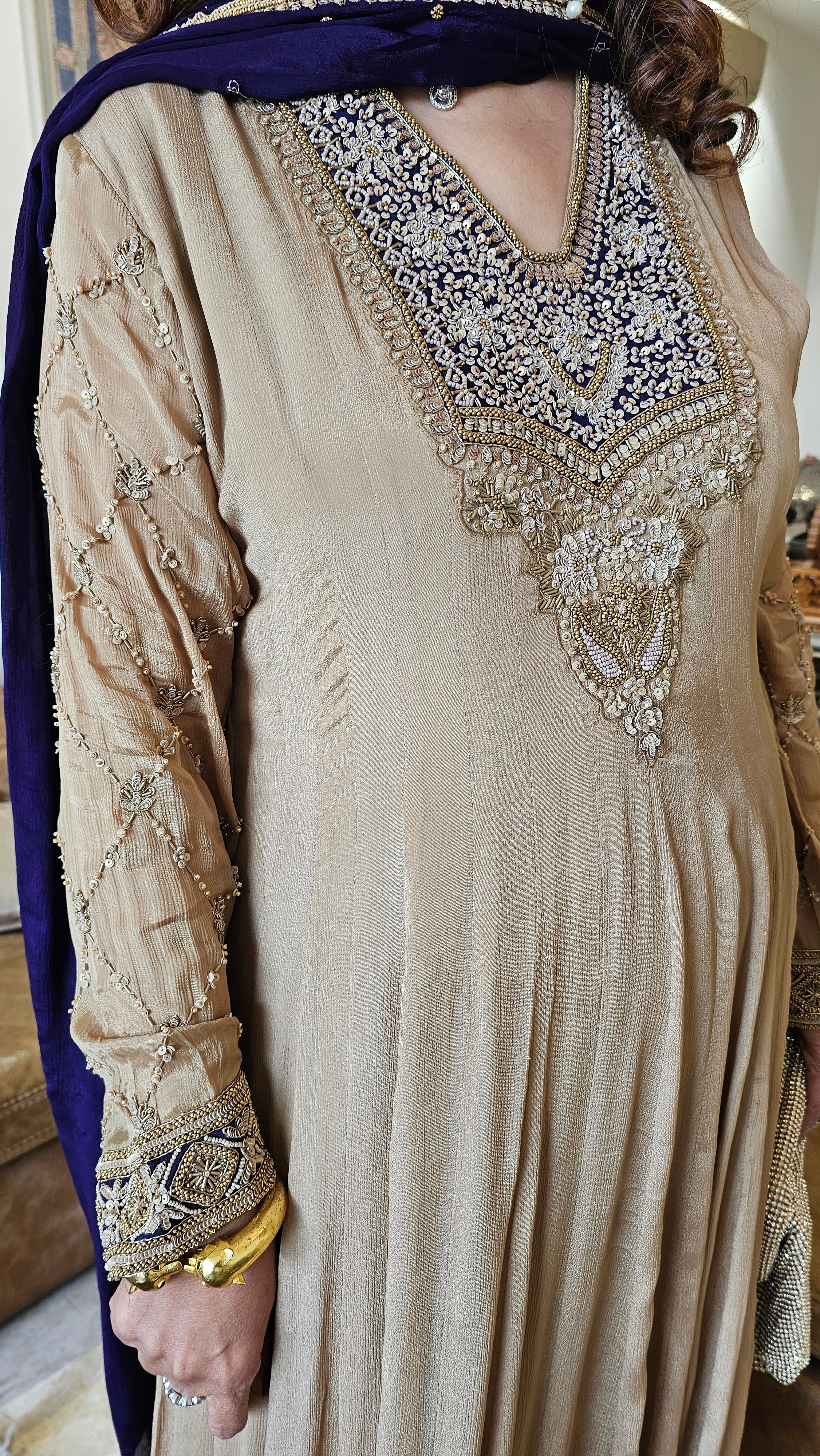 A Royal Full Length One Piece Dress With A Embroidered Dupatta & Hand Embellished Sleeves and Neck Line