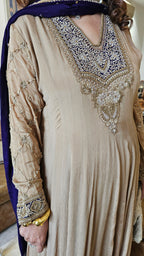 A Royal Full Length One Piece Dress With A Embroidered Dupatta & Hand Embellished Sleeves and Neck Line