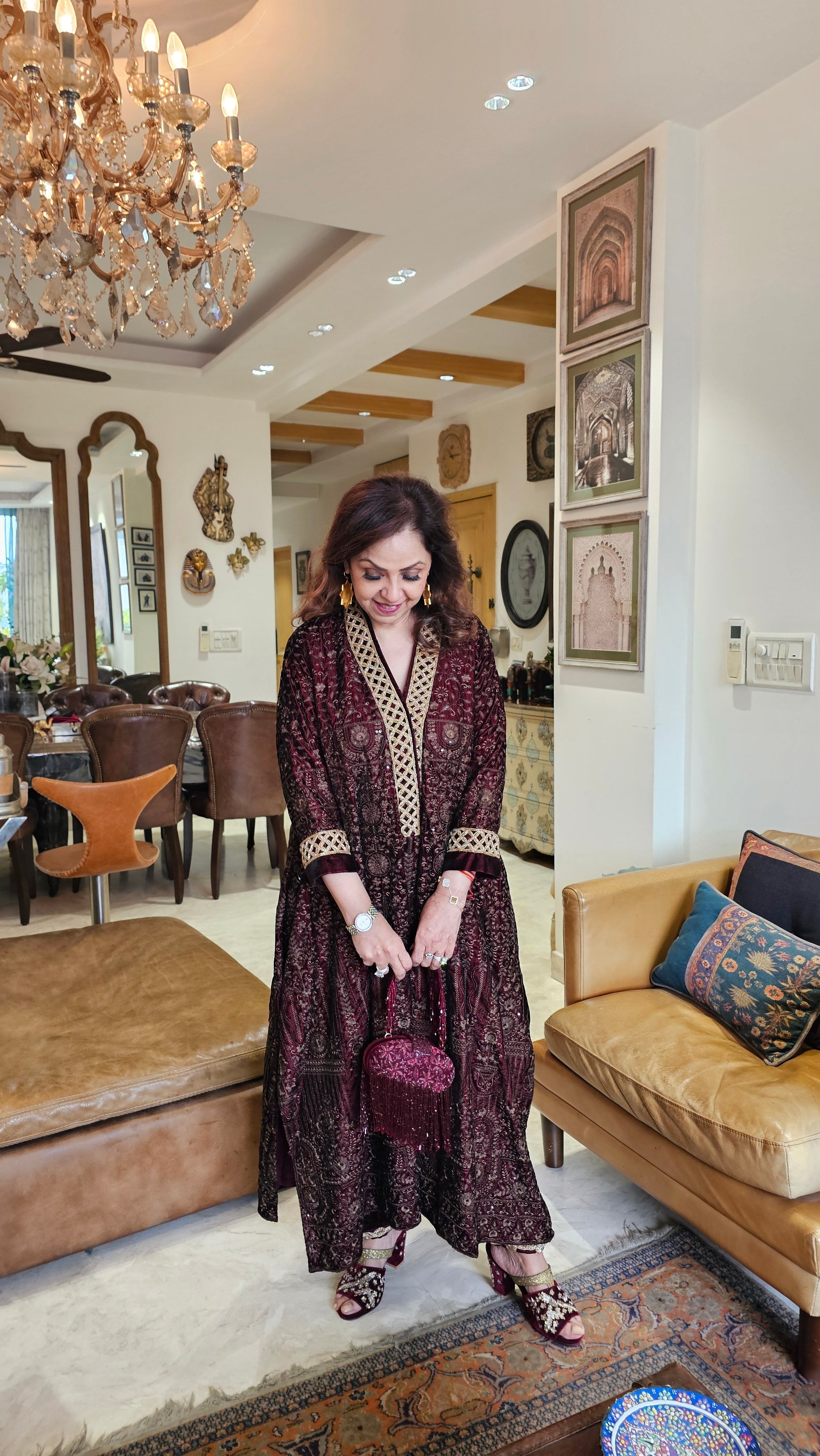 Stunning velvet asymmetric long kurta with Afghani pants trimmed with embroidery perfect for winters do’s