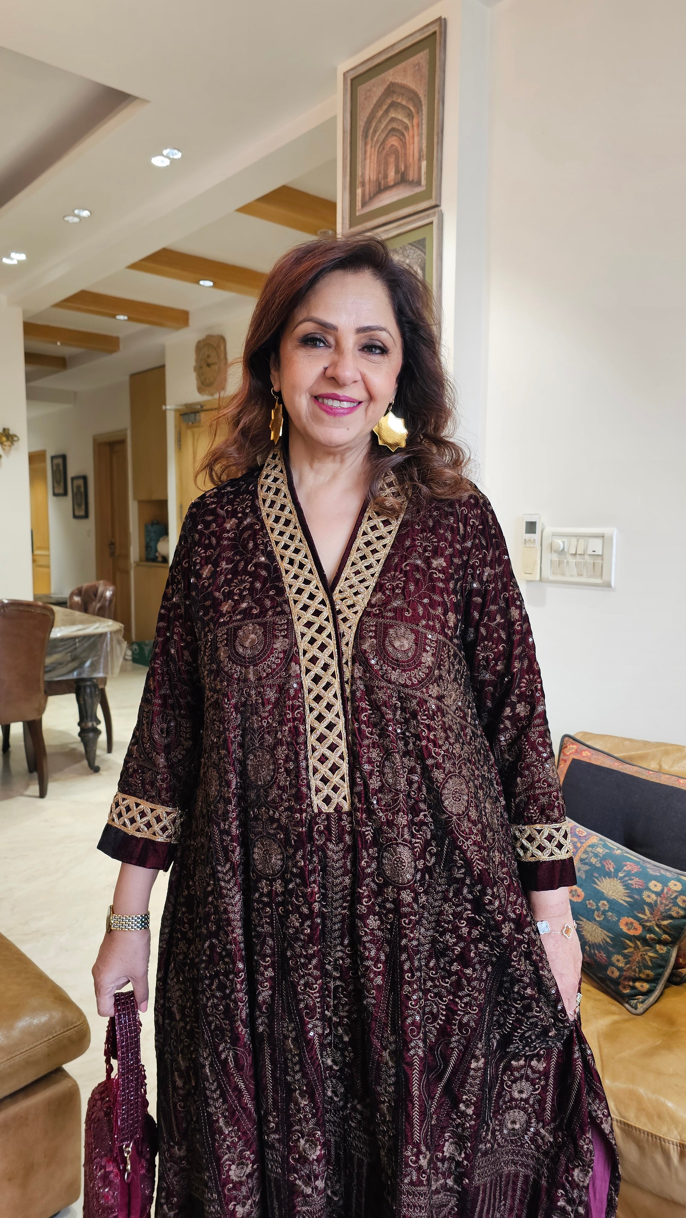 Stunning velvet asymmetric long kurta with Afghani pants trimmed with embroidery perfect for winters do’s