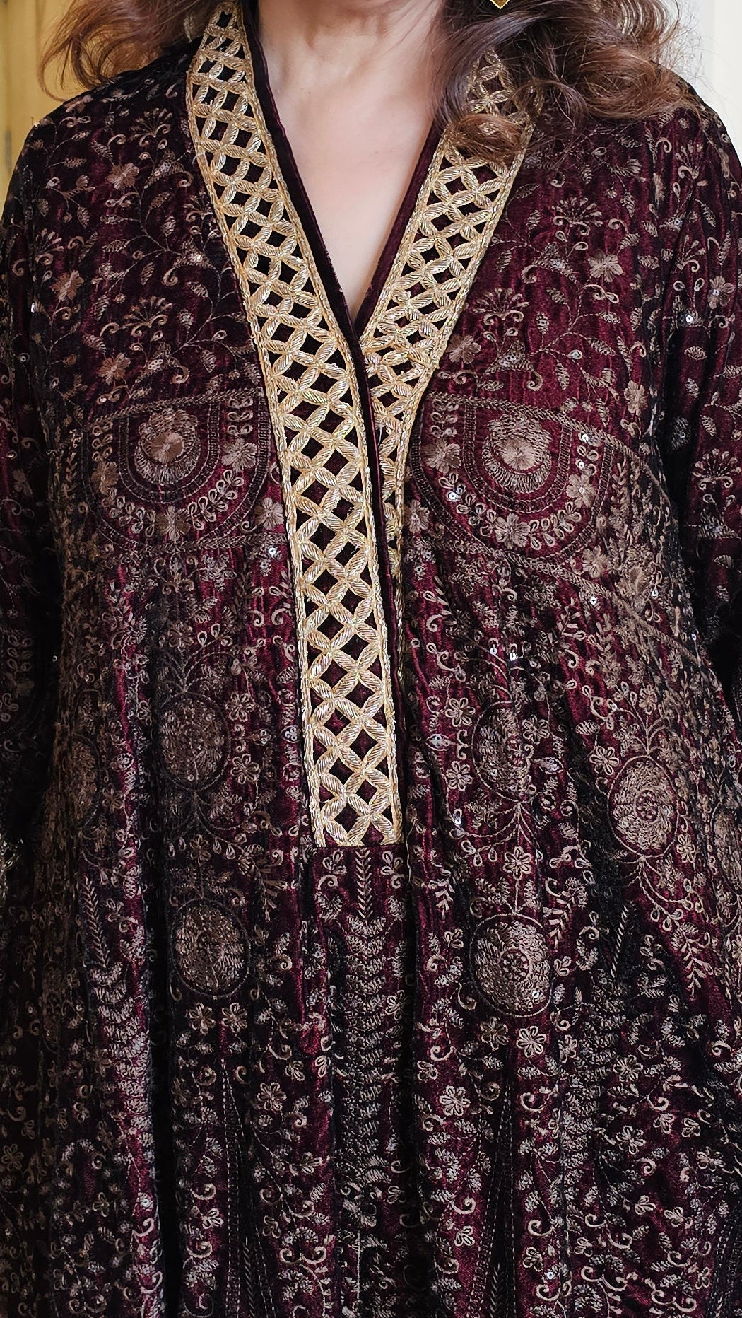 Stunning velvet asymmetric long kurta with Afghani pants trimmed with embroidery perfect for winters do’s