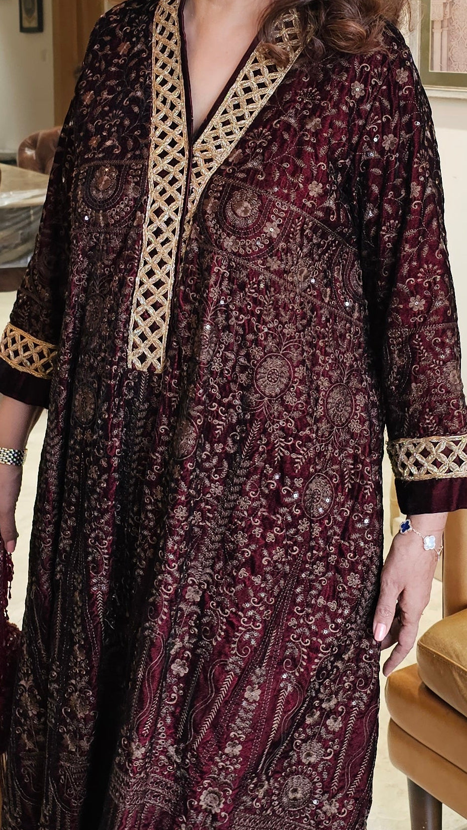 Stunning velvet asymmetric long kurta with Afghani pants trimmed with embroidery perfect for winters do’s