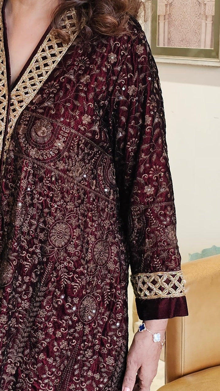 Stunning velvet asymmetric long kurta with Afghani pants trimmed with embroidery perfect for winters do’s