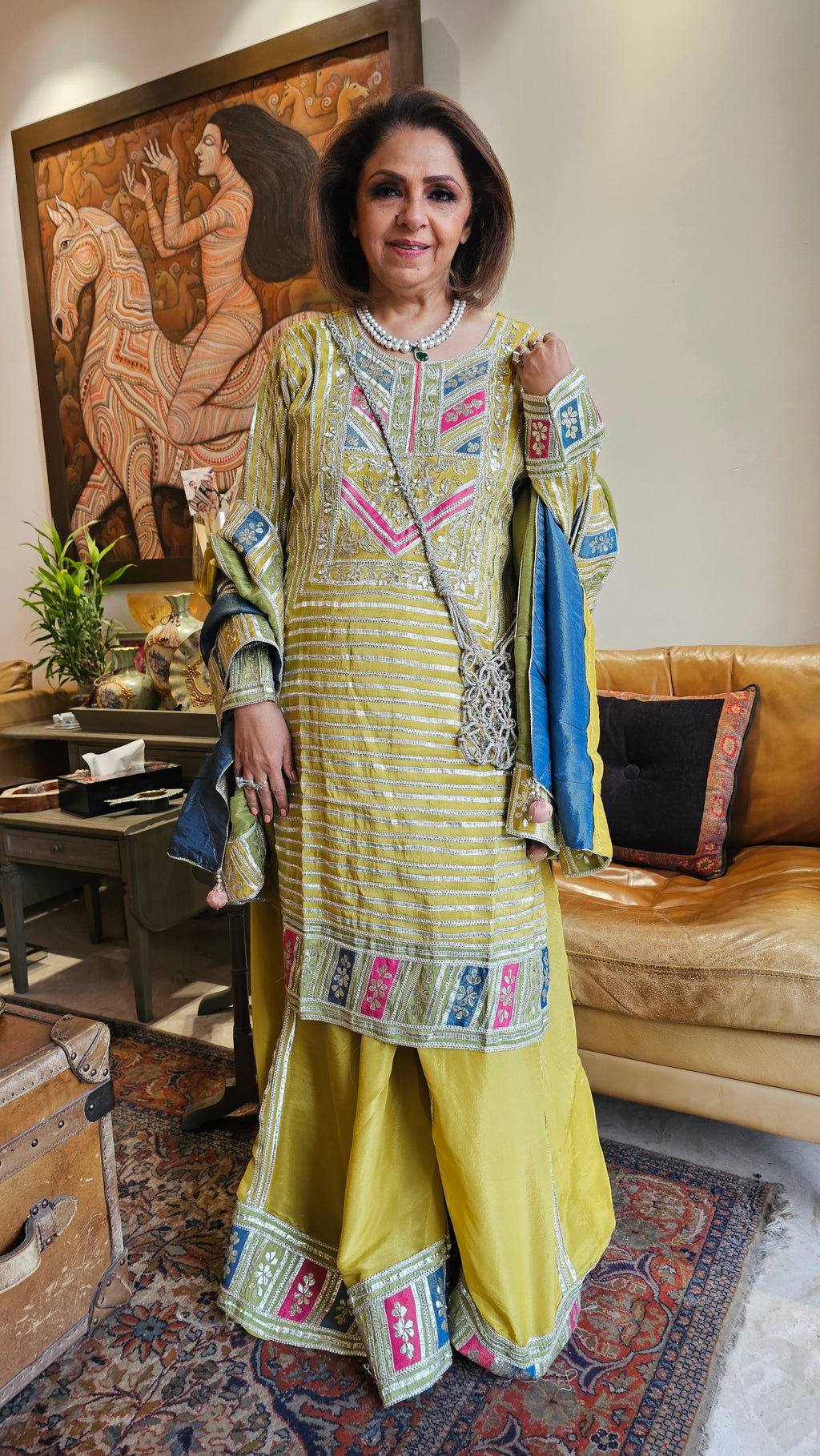 Beautiful tissue top, Bottom & Dupatta embellished with gota patti & mirror work