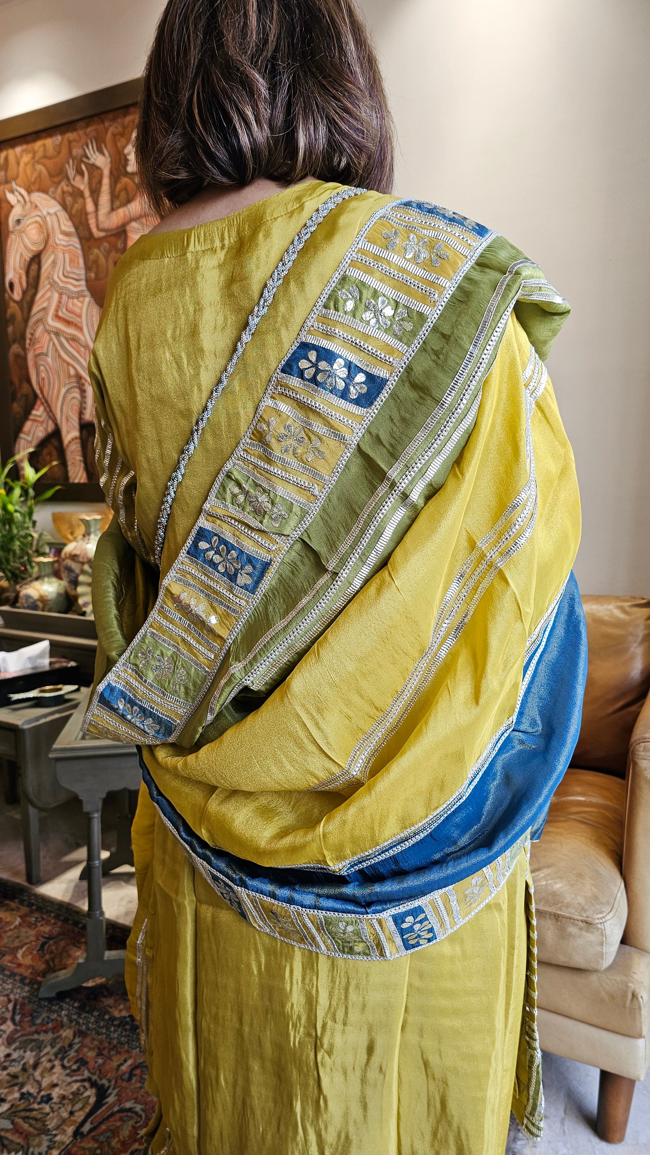 Beautiful tissue top, Bottom & Dupatta embellished with gota patti & mirror work