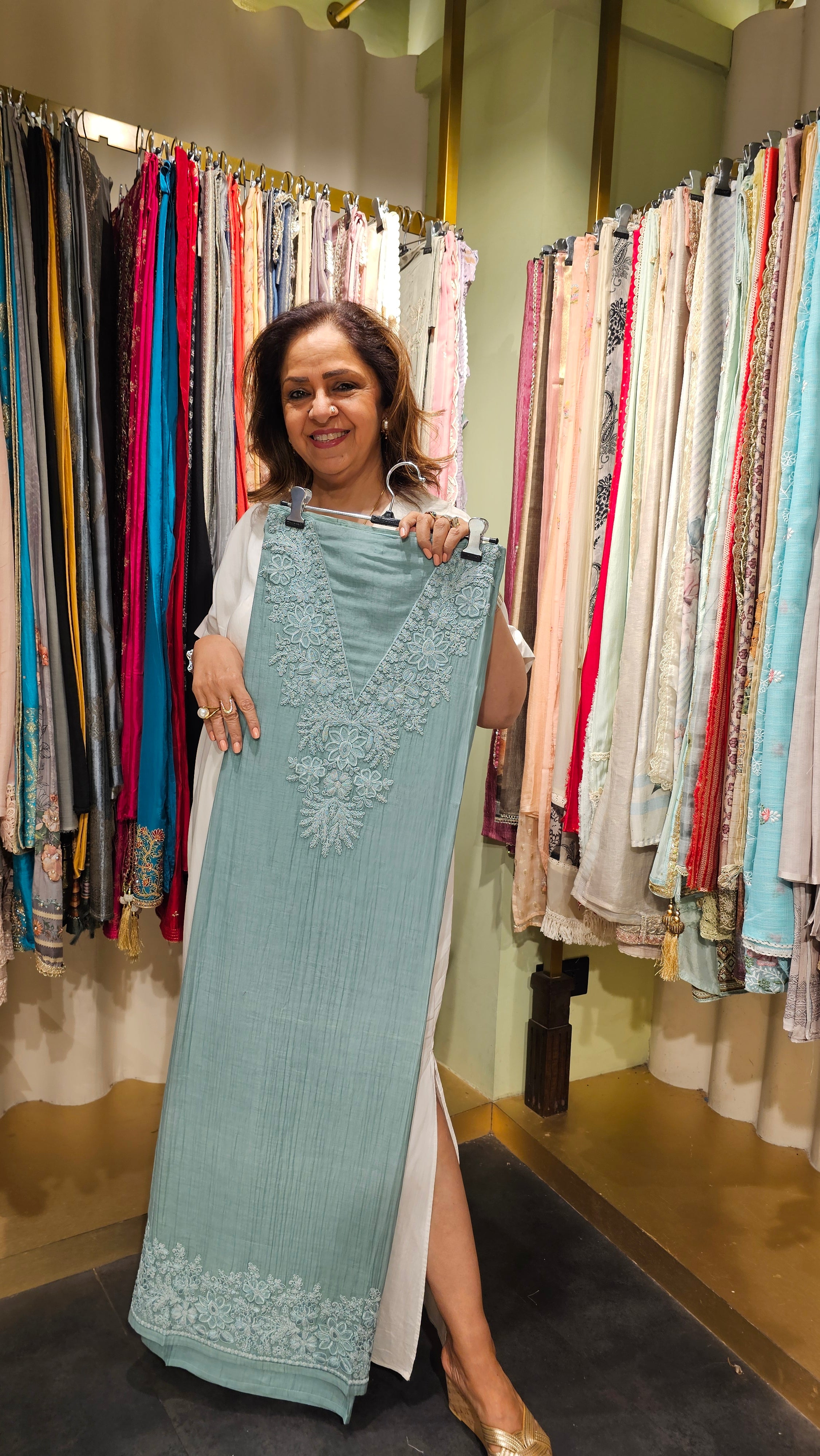 Beautiful Mul Fabric Suit trimmed With thread work