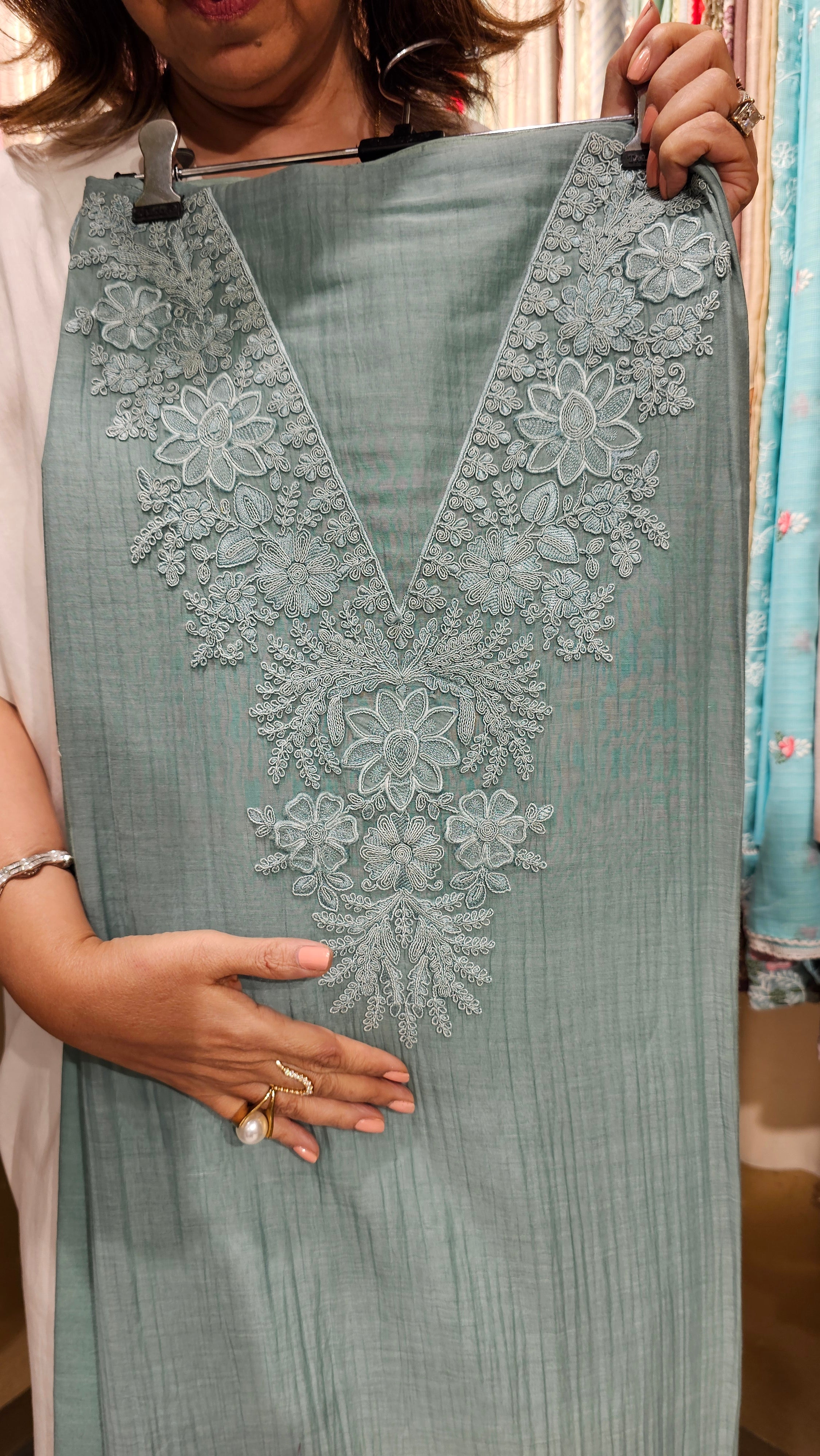 Beautiful Mul Fabric Suit trimmed With thread work