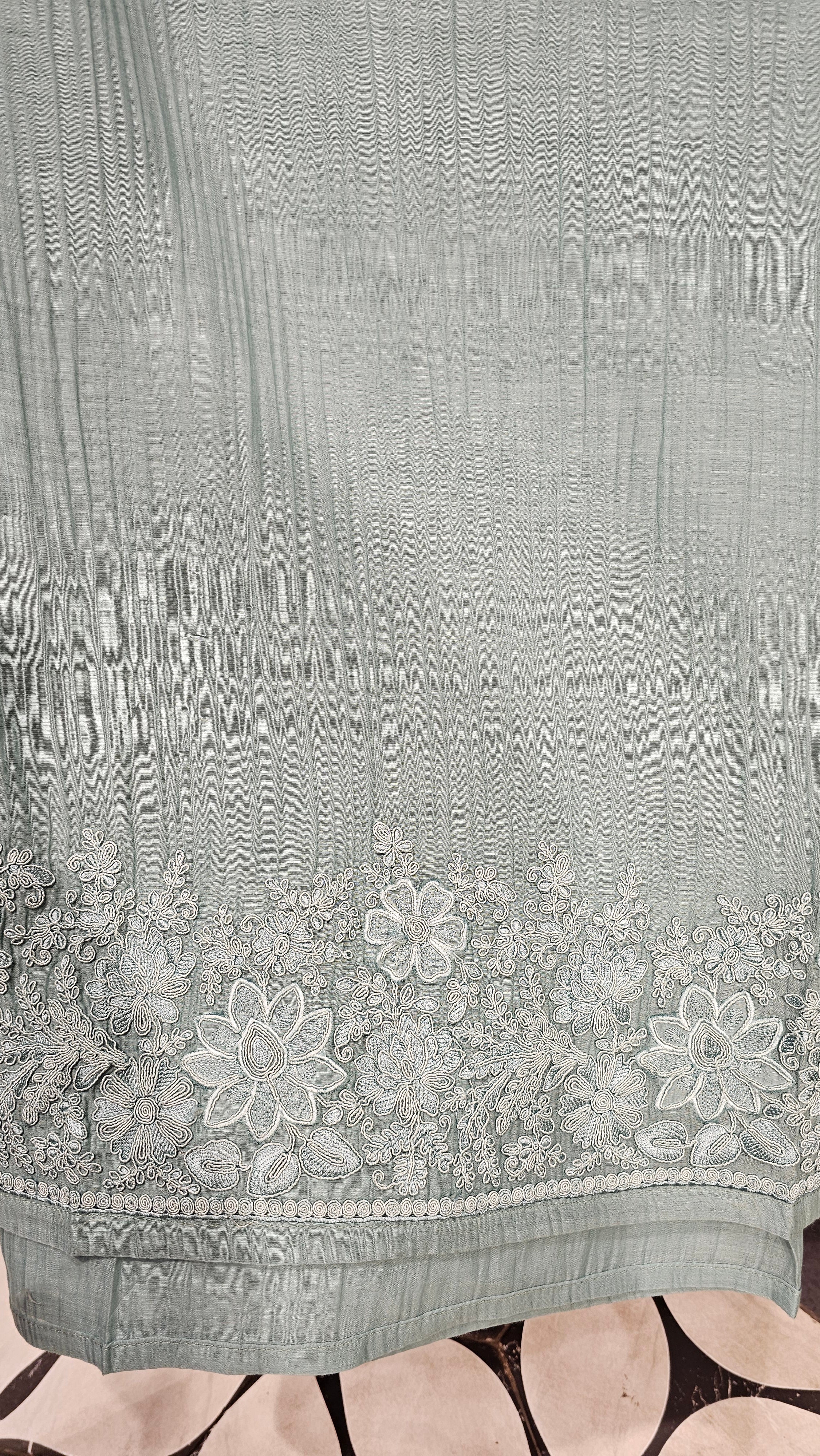 Beautiful Mul Fabric Suit trimmed With thread work