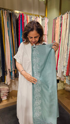 Beautiful Mul Fabric Suit trimmed With thread work
