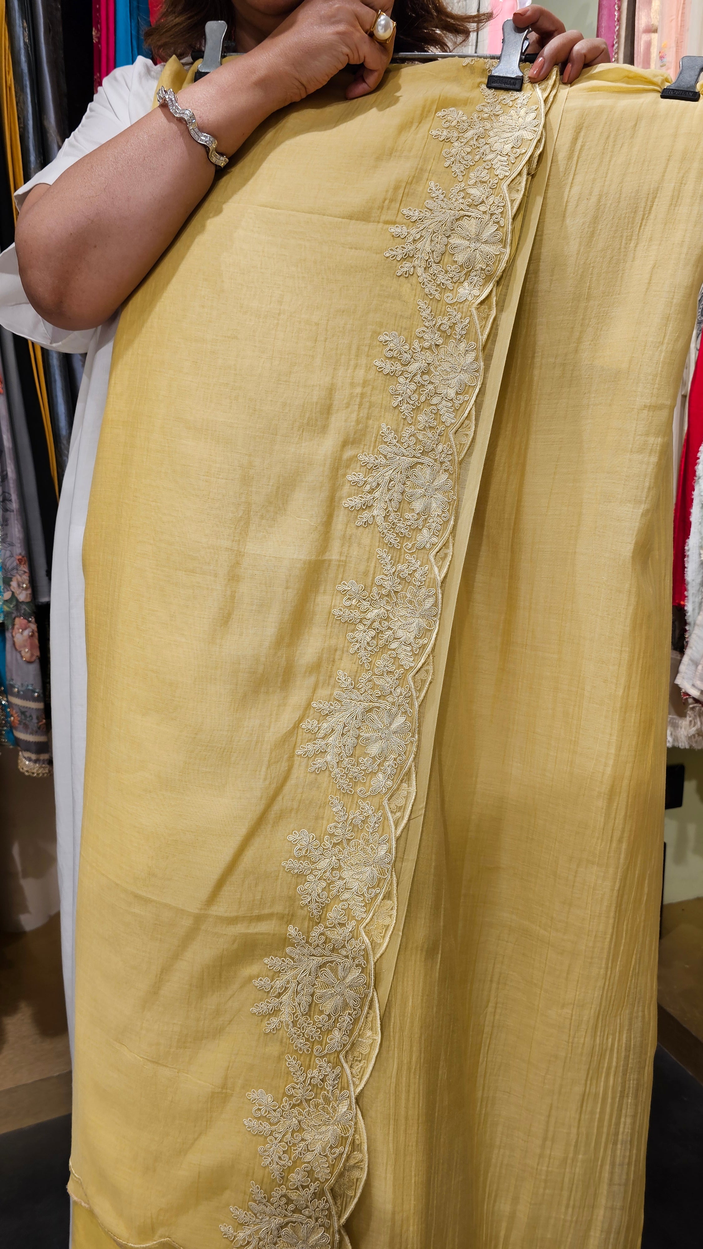 Beautiful Mul Fabric Suit trimmed With thread work