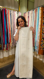Beautiful Mul Fabric Suit trimmed With Resham Work