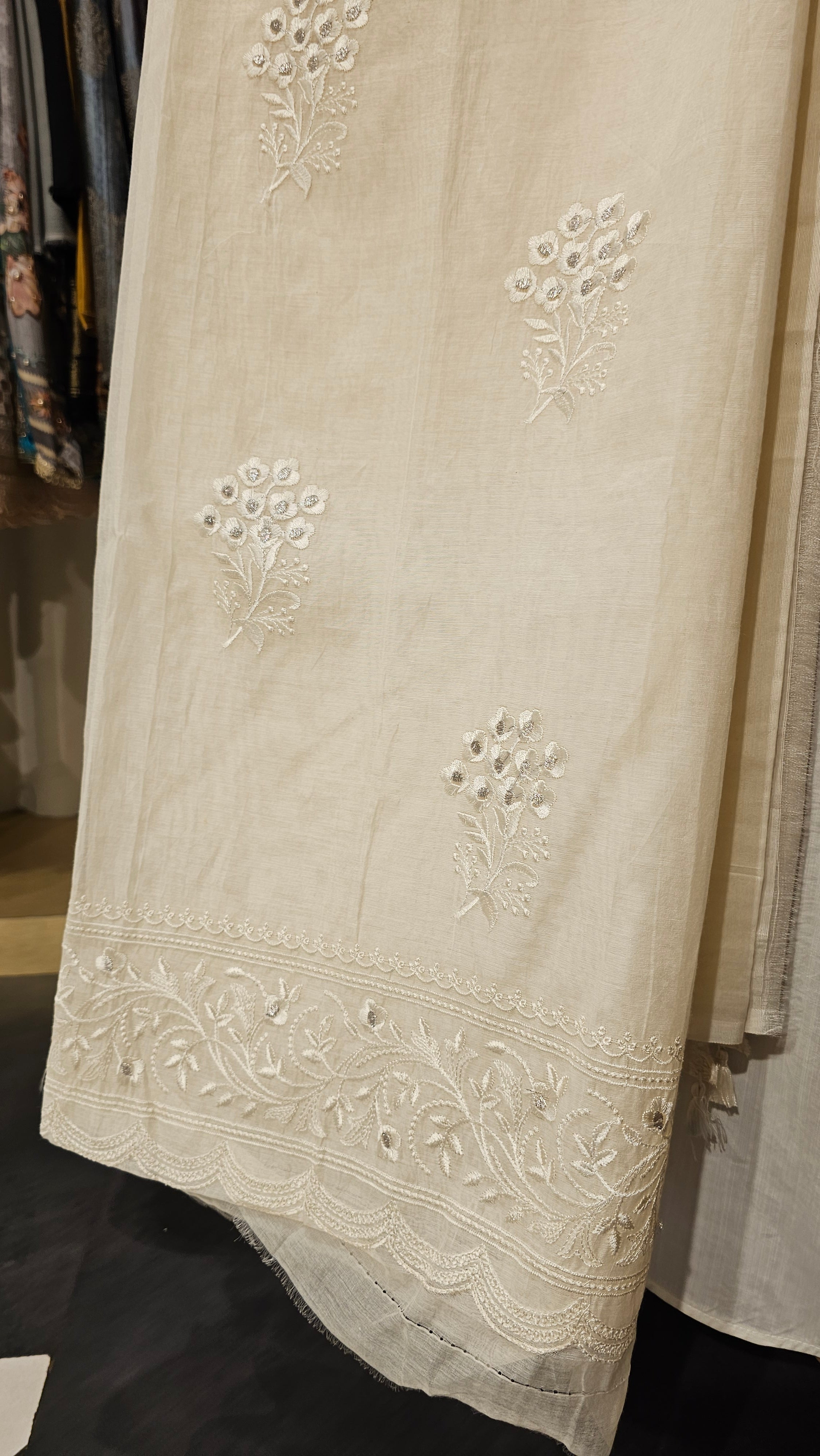 Beautiful Mul Fabric Suit trimmed With Resham Work