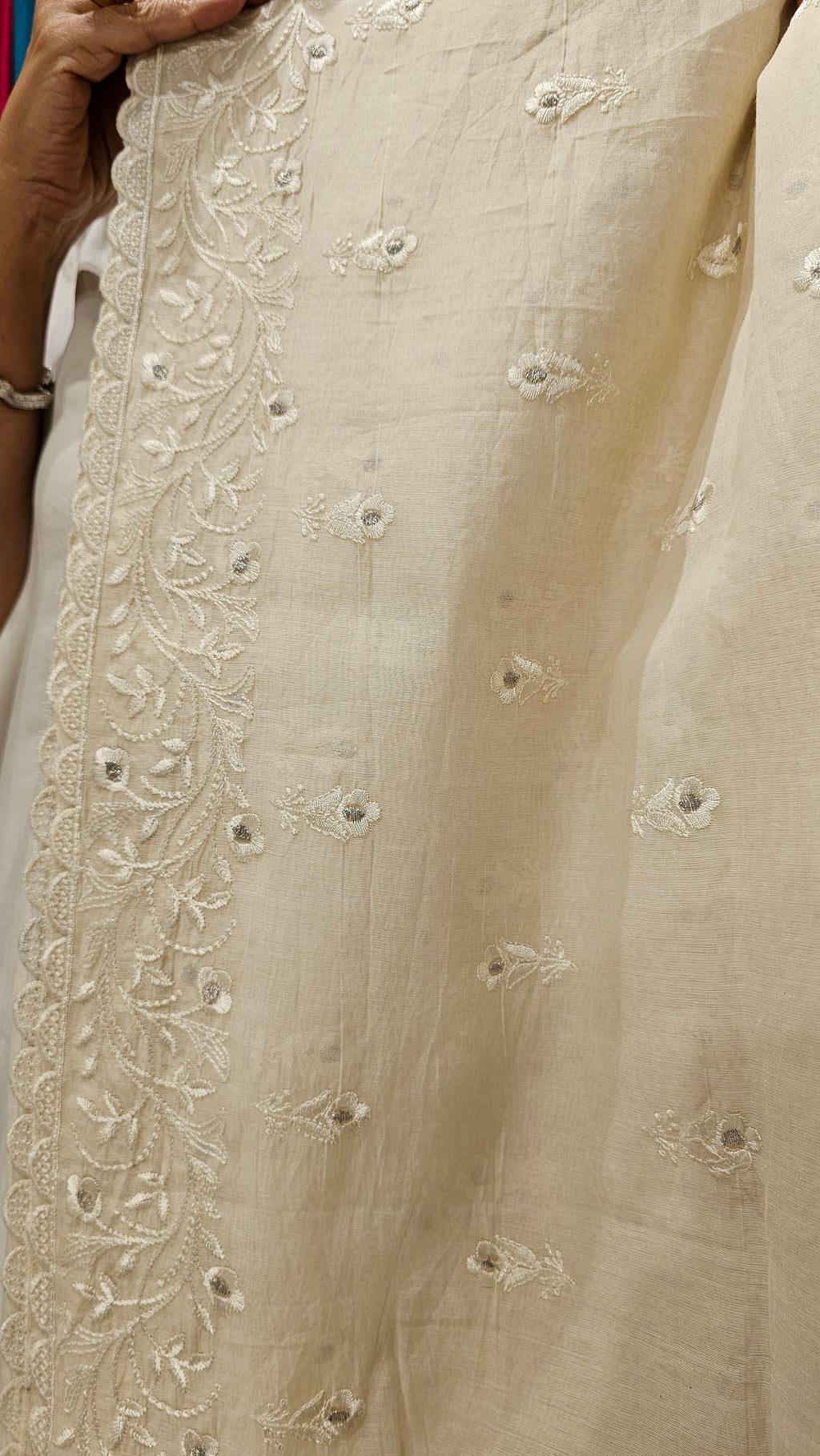Beautiful Mul Fabric Suit trimmed With Resham Work