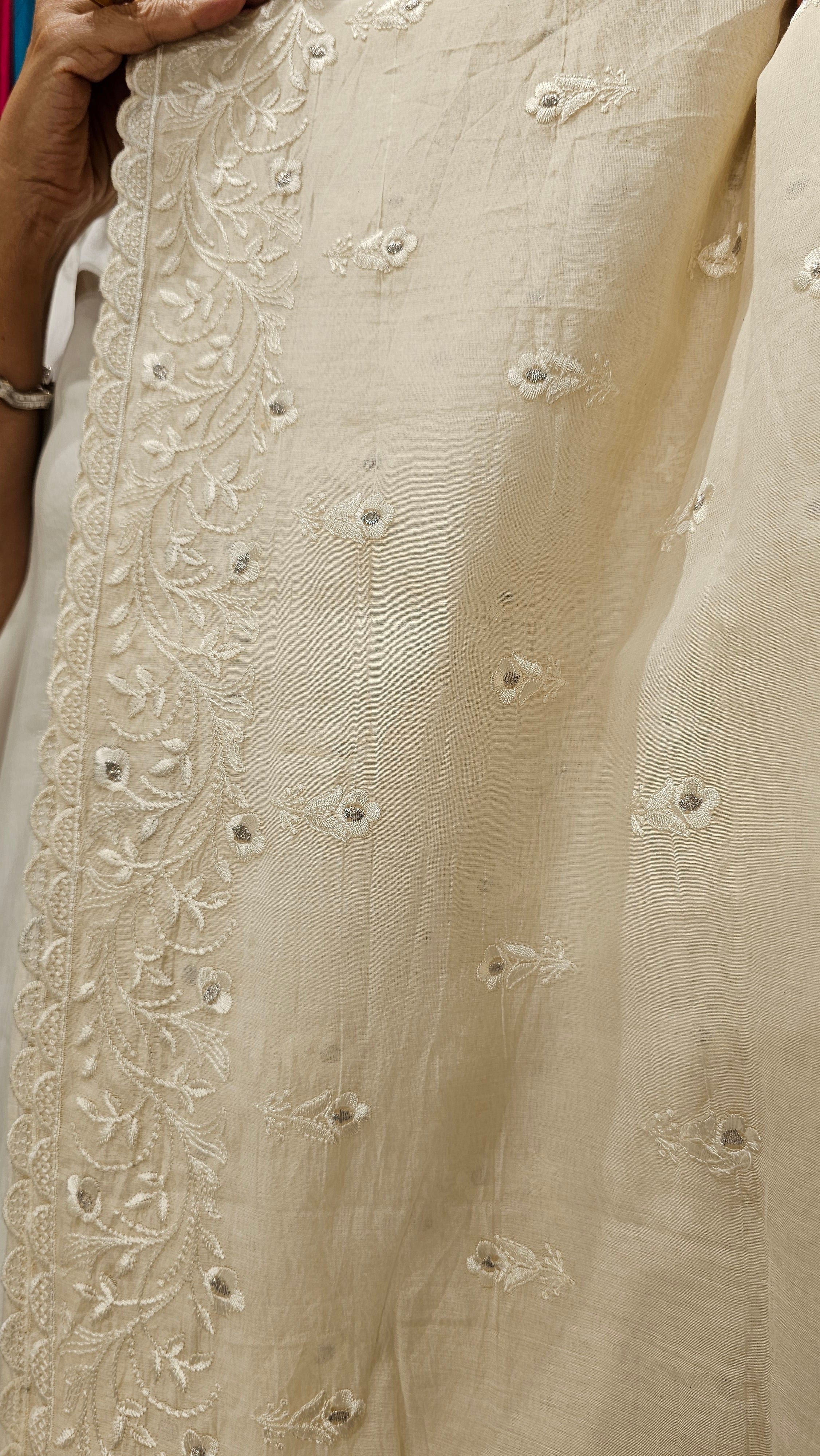 Beautiful Mul Fabric Suit trimmed With Resham Work