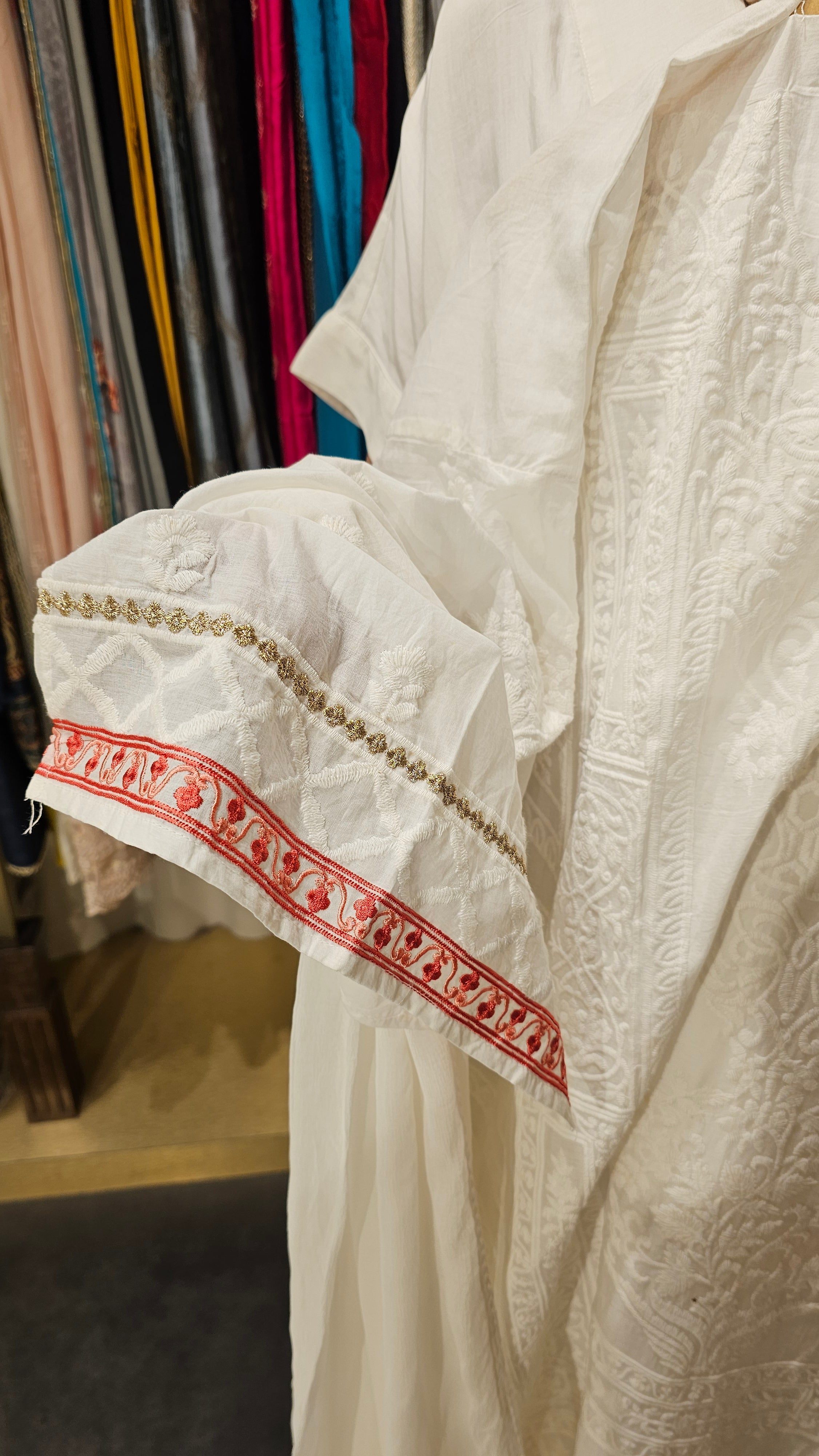 Beautiful Cotton Fabric Suit trimmed With Thread Work