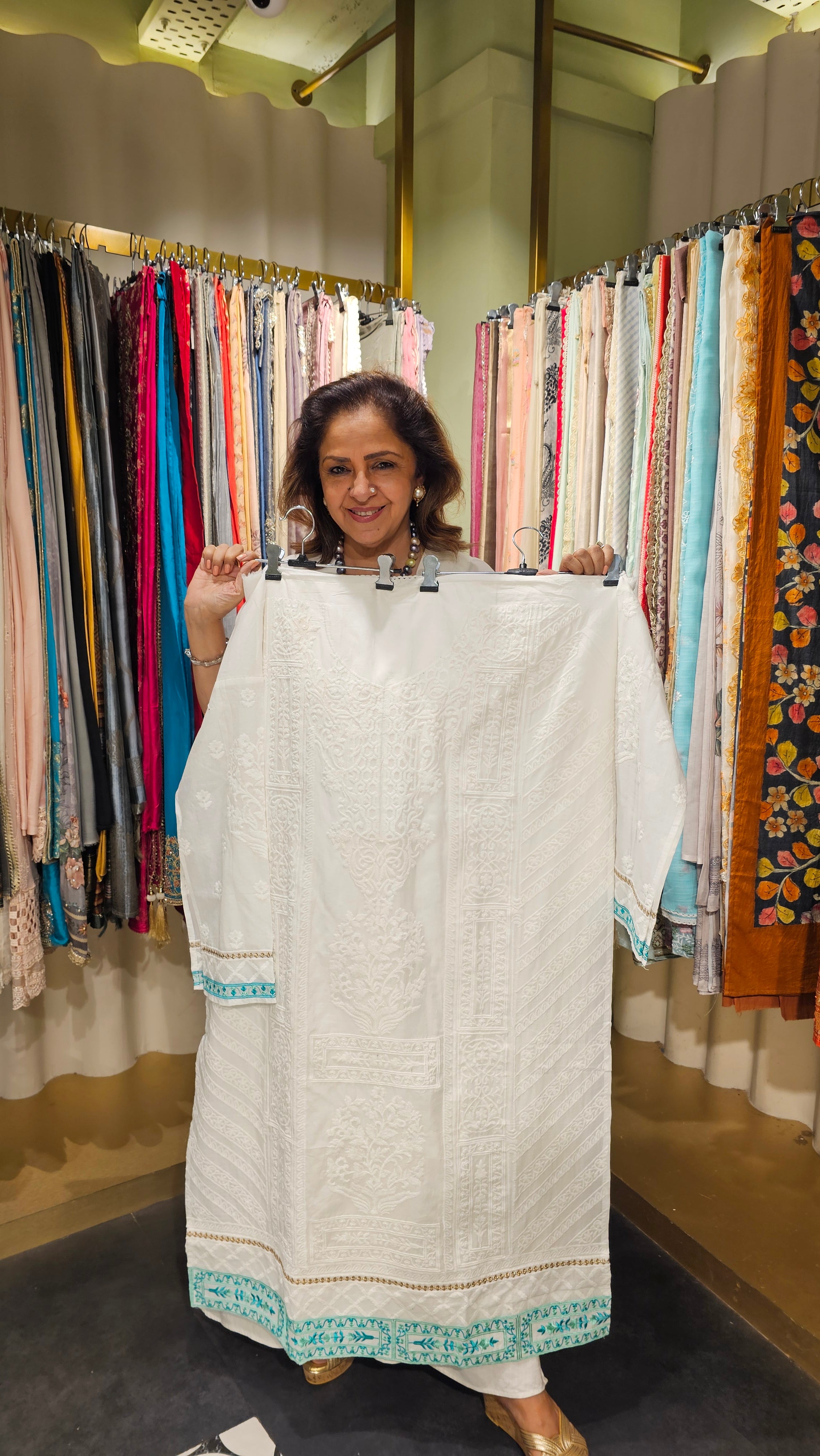 Beautiful Cotton Fabric Suit trimmed With Thread Work