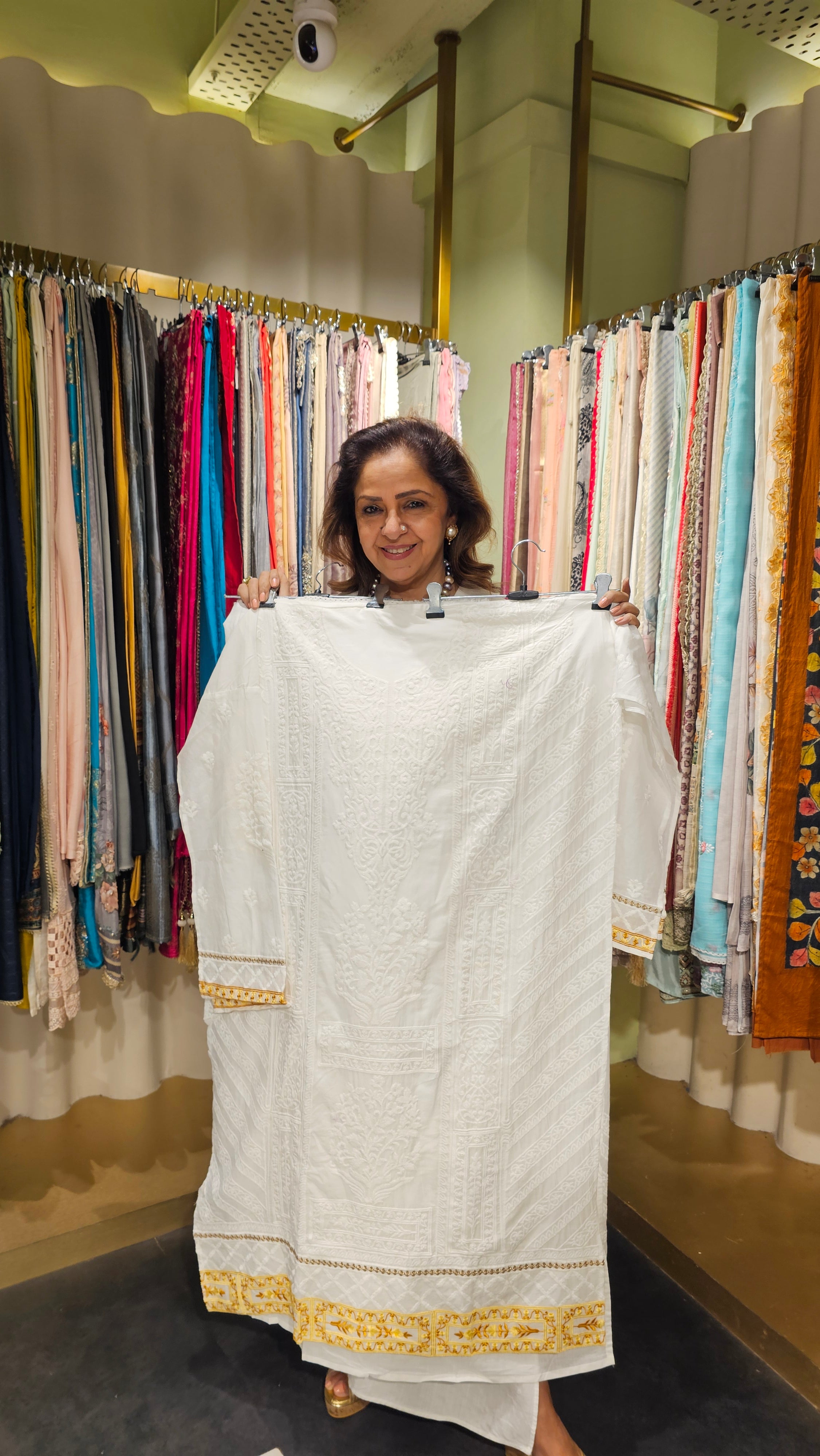 Beautiful Cotton Fabric Suit trimmed With Thread Work