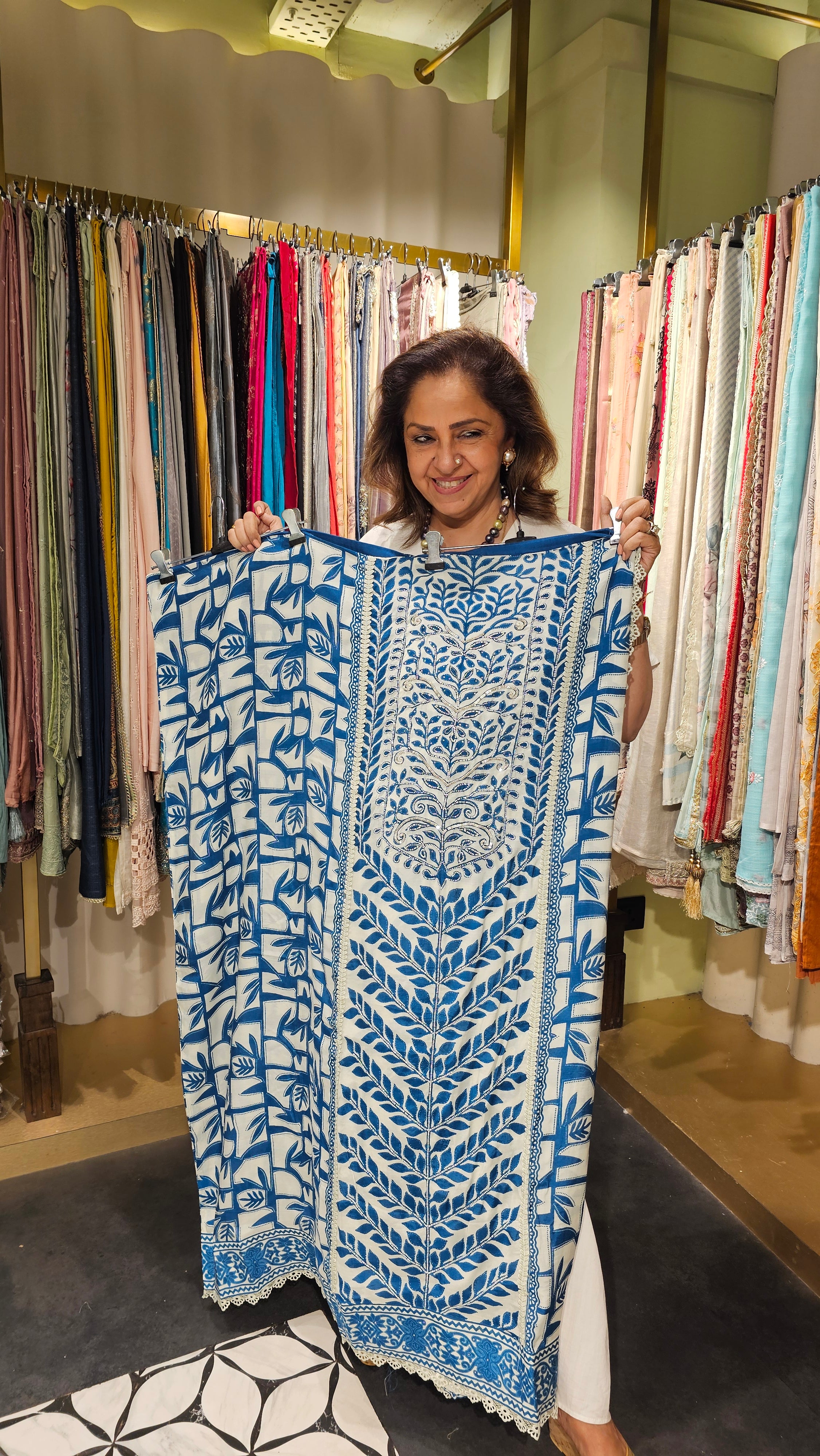 Beautiful Muslin Fabric Suit trimmed With Hand work