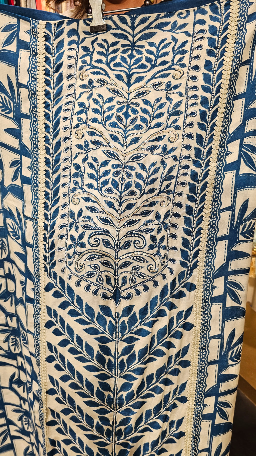 Beautiful Muslin Fabric Suit trimmed With Hand work