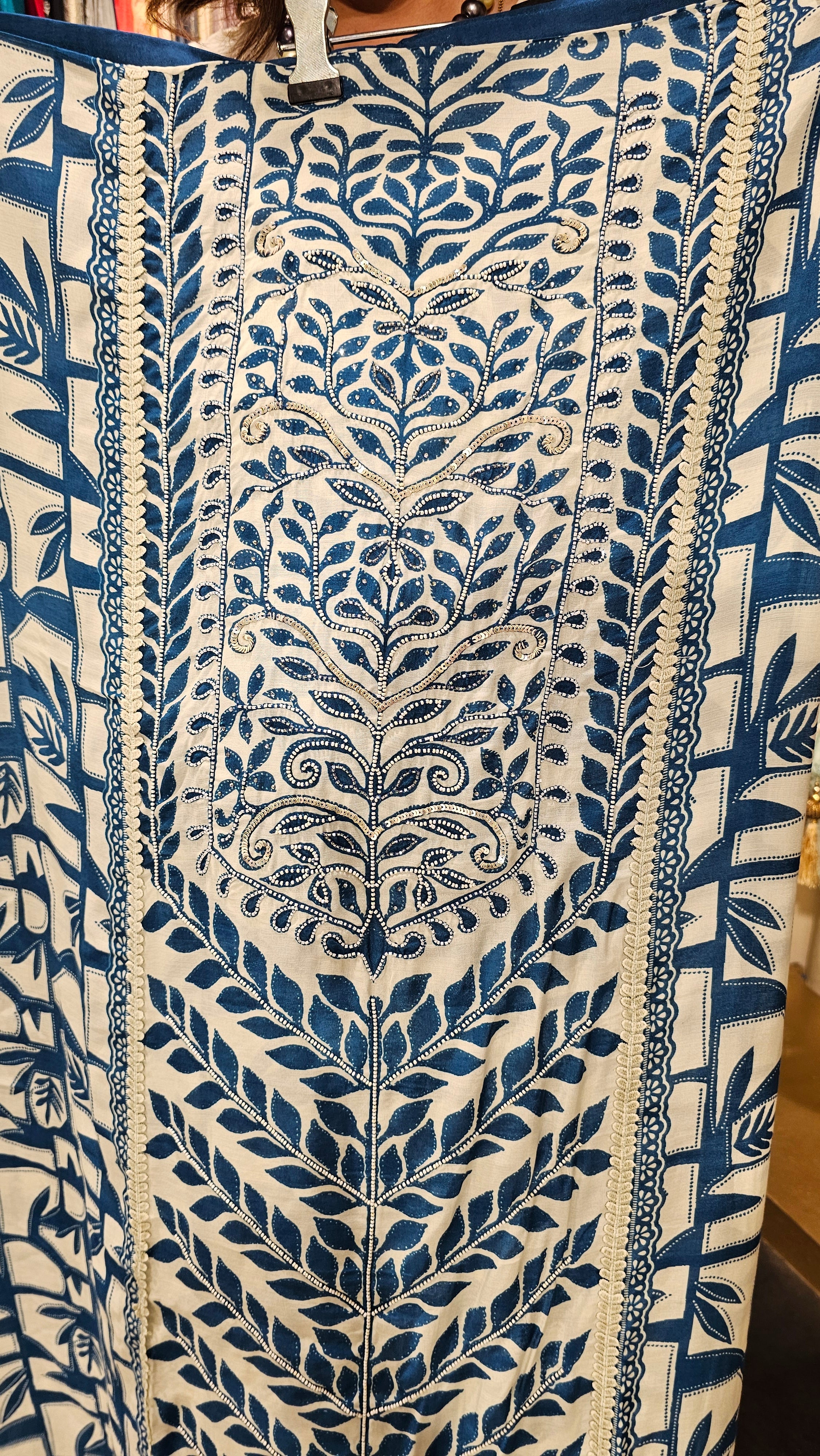 Beautiful Muslin Fabric Suit trimmed With Hand work