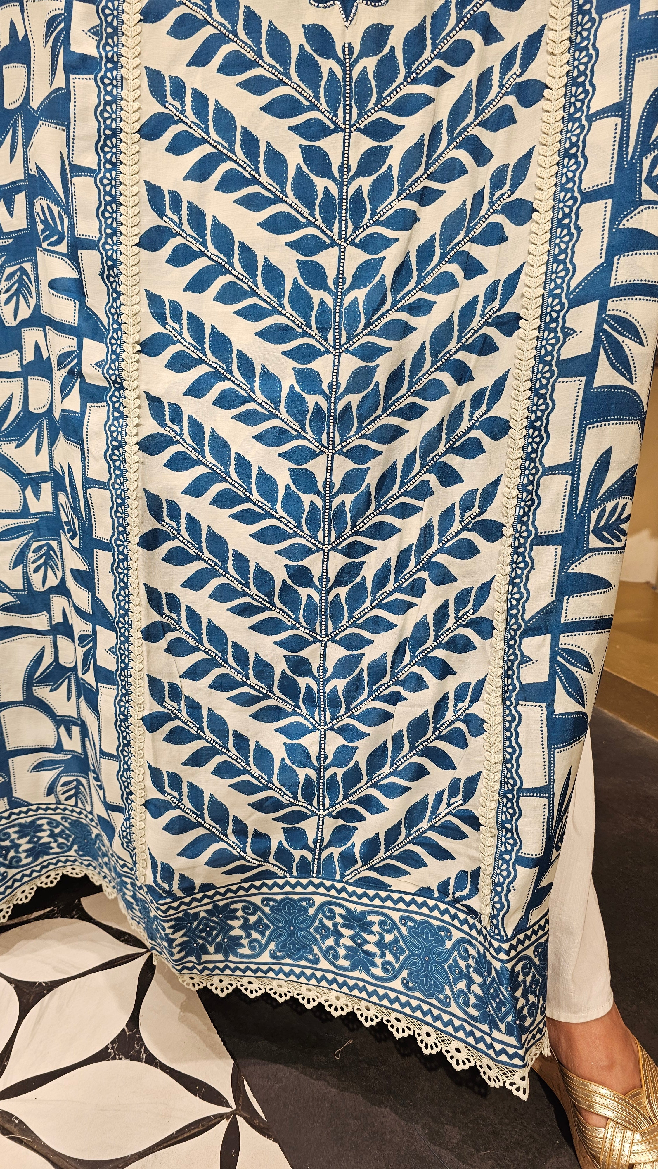 Beautiful Muslin Fabric Suit trimmed With Hand work