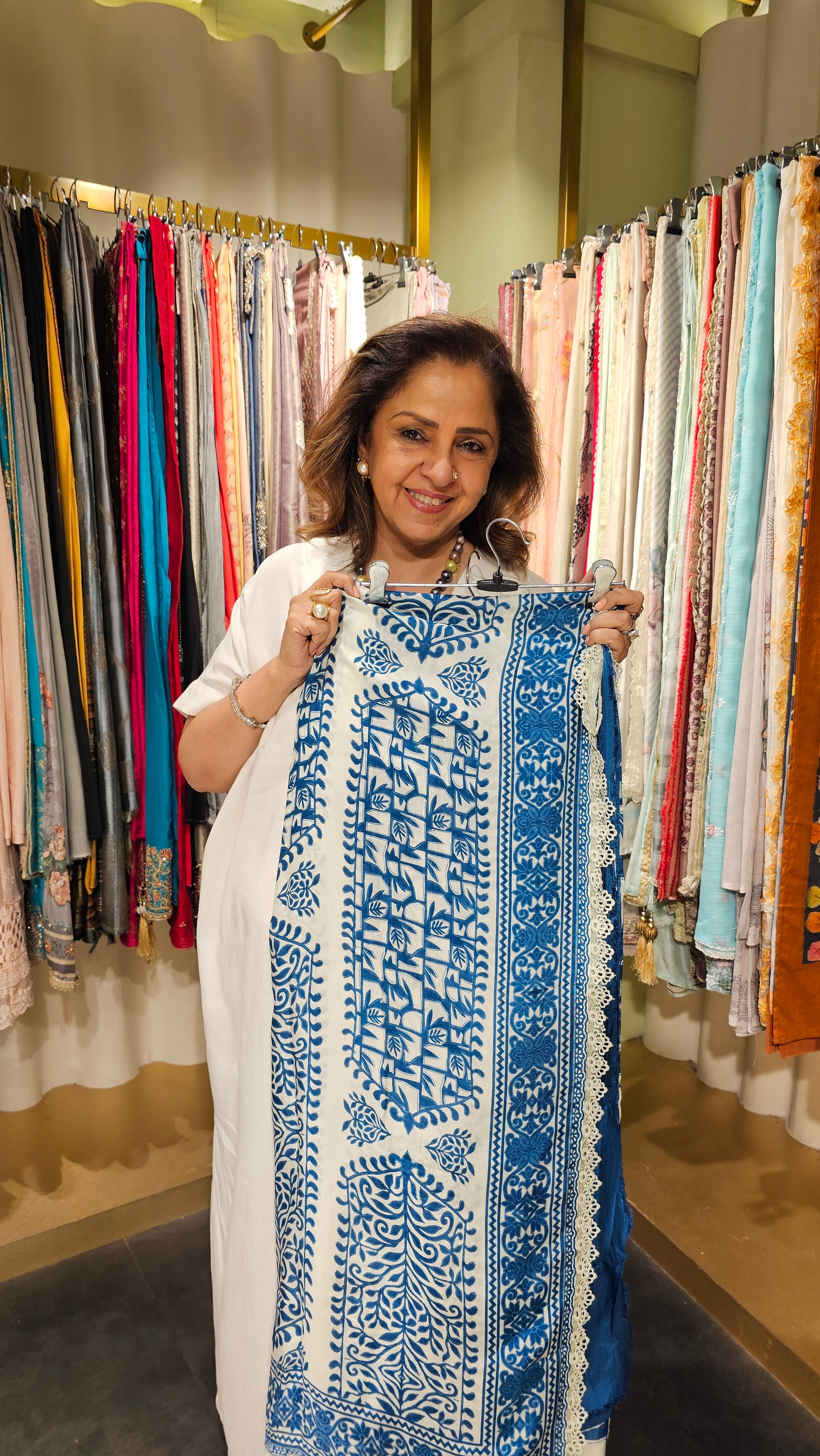 Beautiful Muslin Fabric Suit trimmed With Hand work