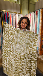 Beautiful Muslin Fabric Suit trimmed With Hand work