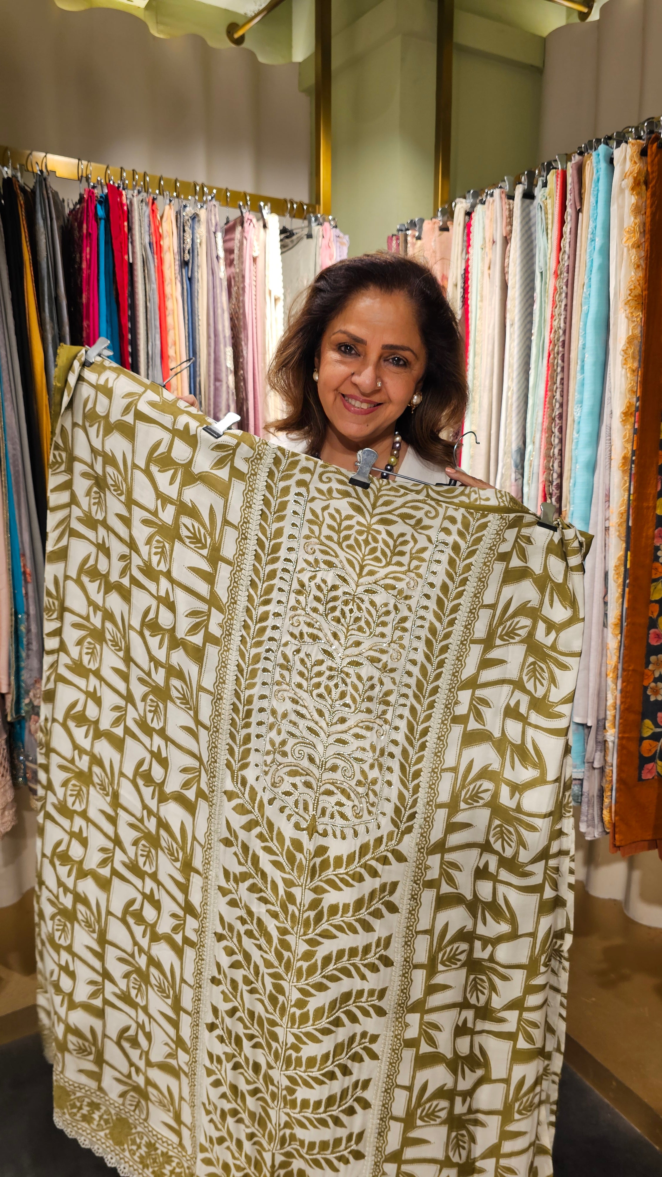 Beautiful Muslin Fabric Suit trimmed With Hand work