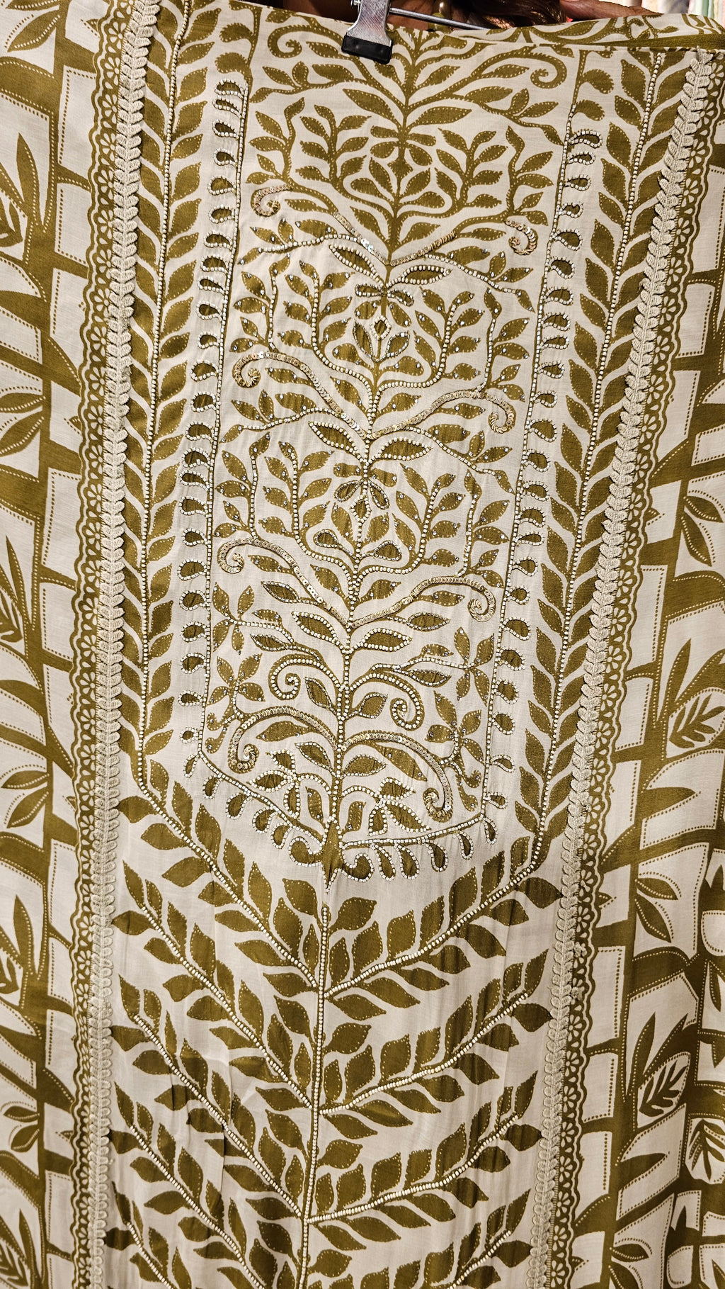 Beautiful Muslin Fabric Suit trimmed With Hand work