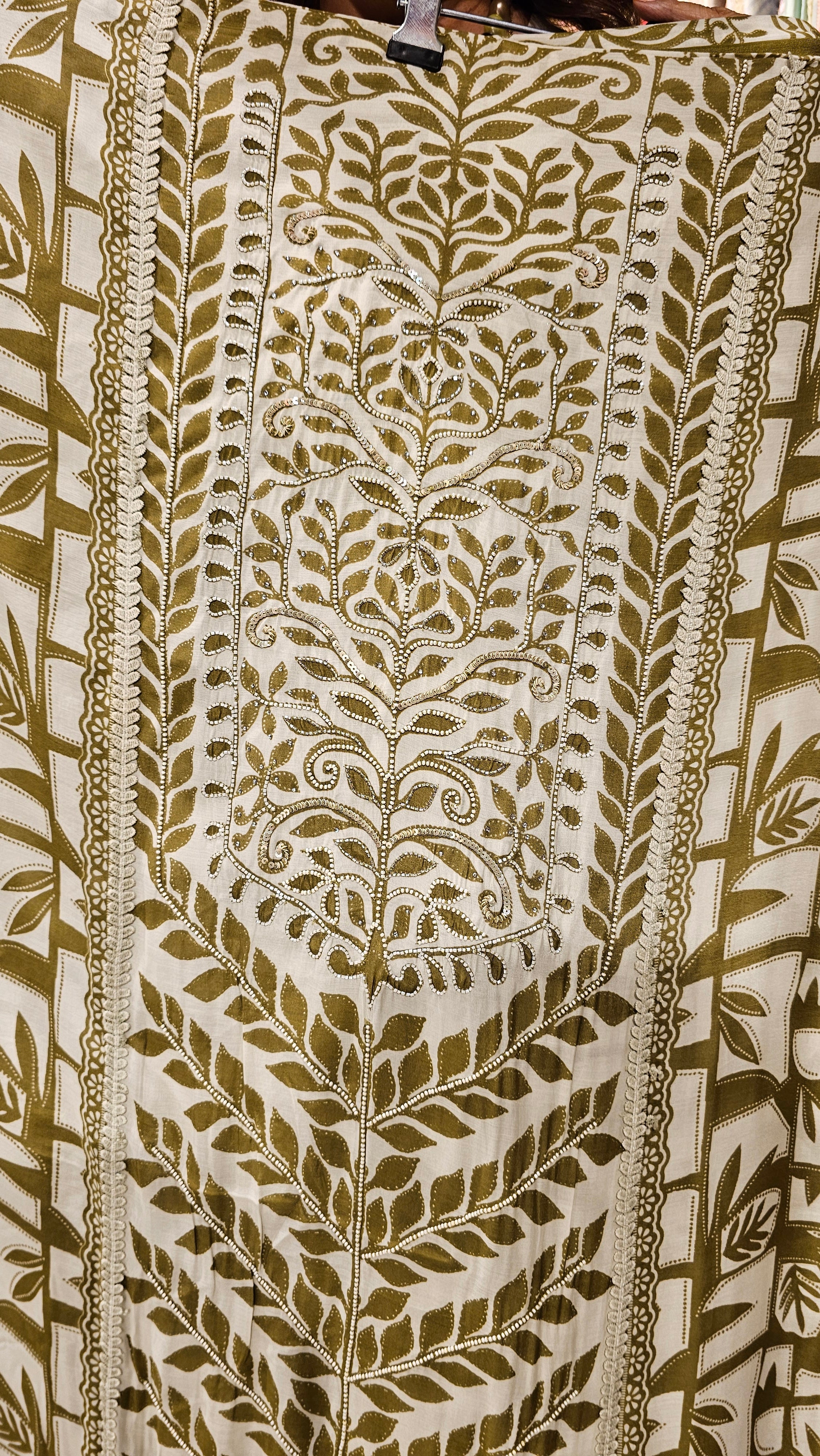 Beautiful Muslin Fabric Suit trimmed With Hand work