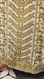 Beautiful Muslin Fabric Suit trimmed With Hand work