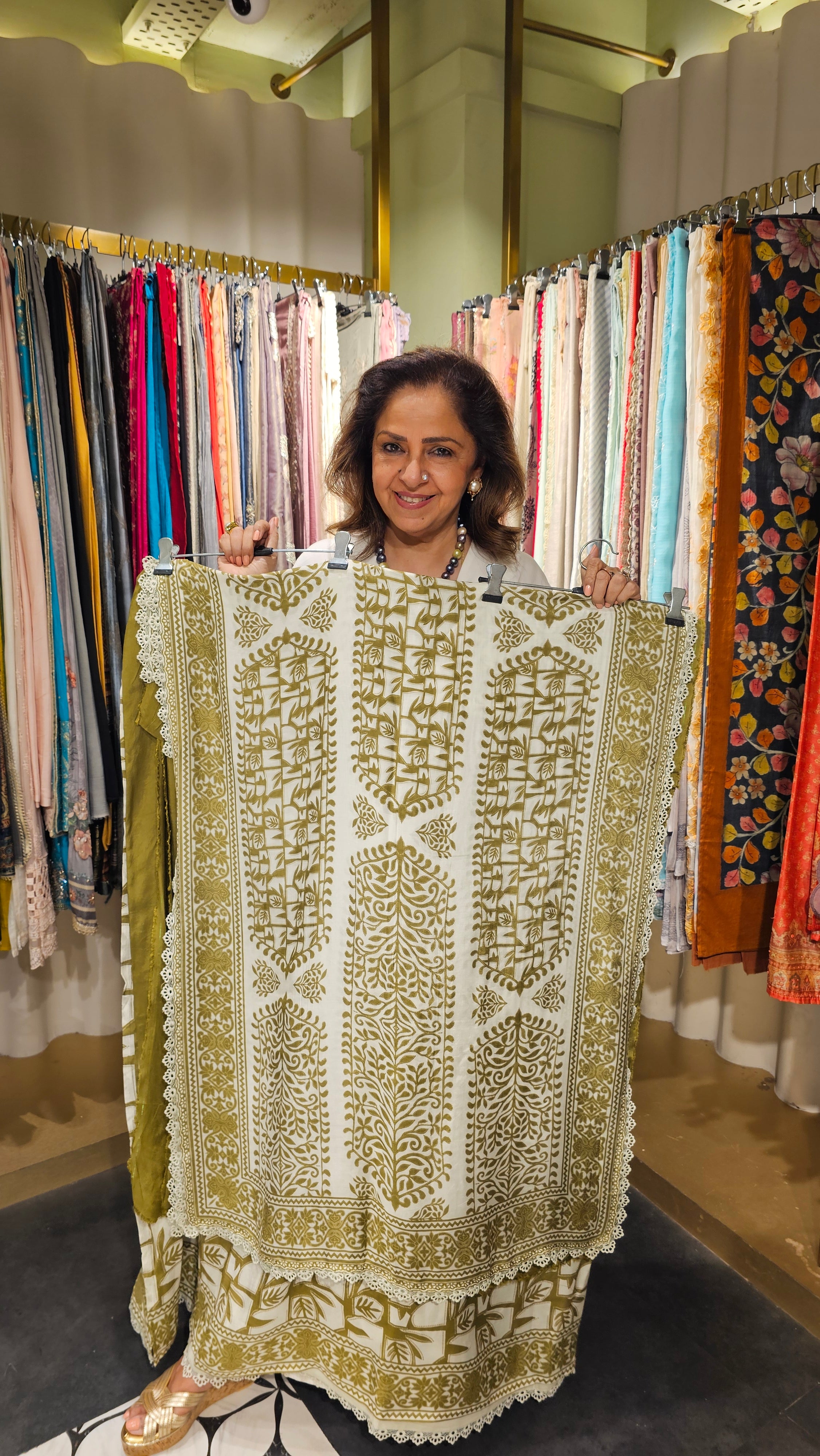 Beautiful Muslin Fabric Suit trimmed With Hand work