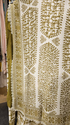 Beautiful Muslin Fabric Suit trimmed With Hand work