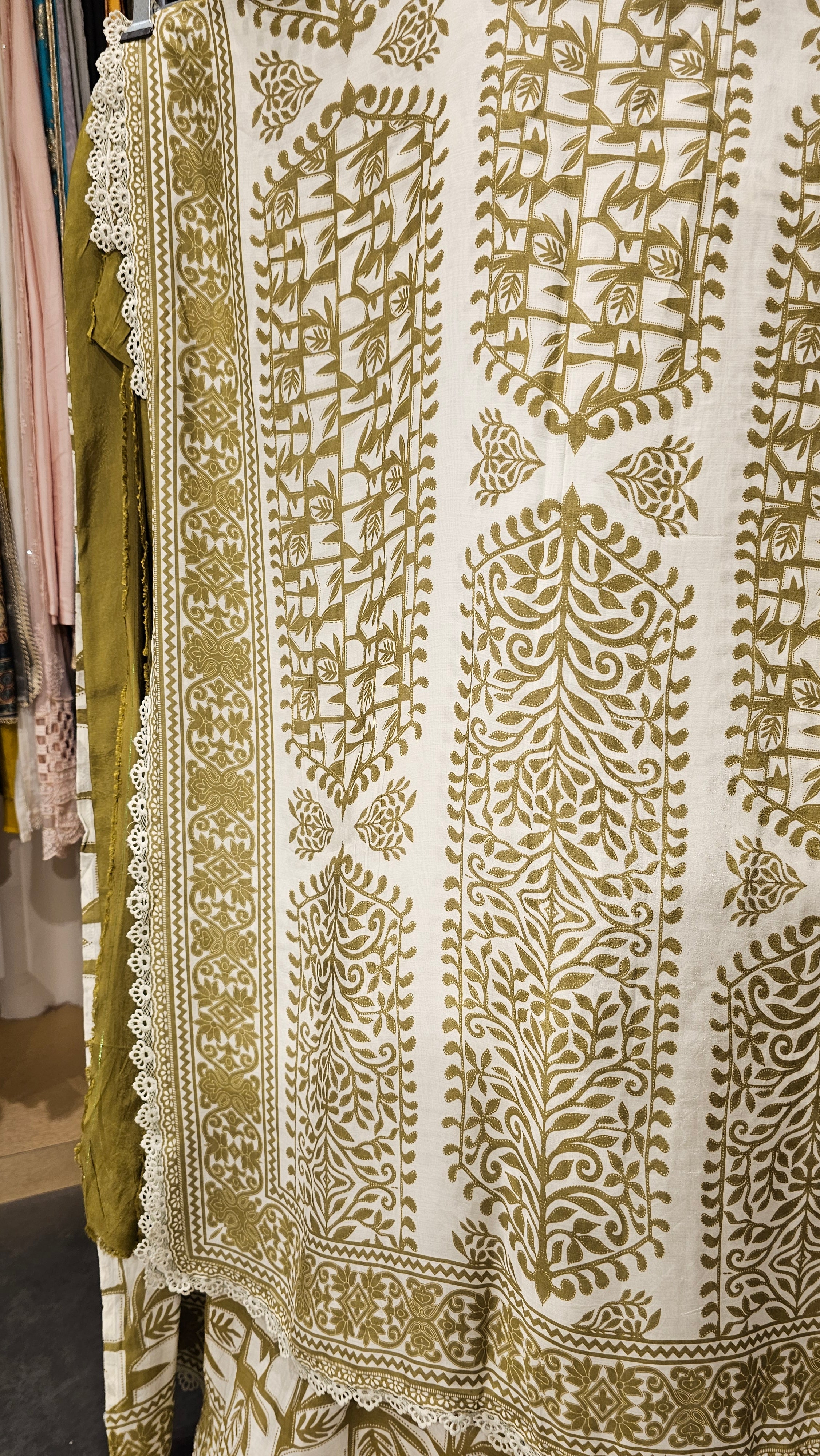 Beautiful Muslin Fabric Suit trimmed With Hand work