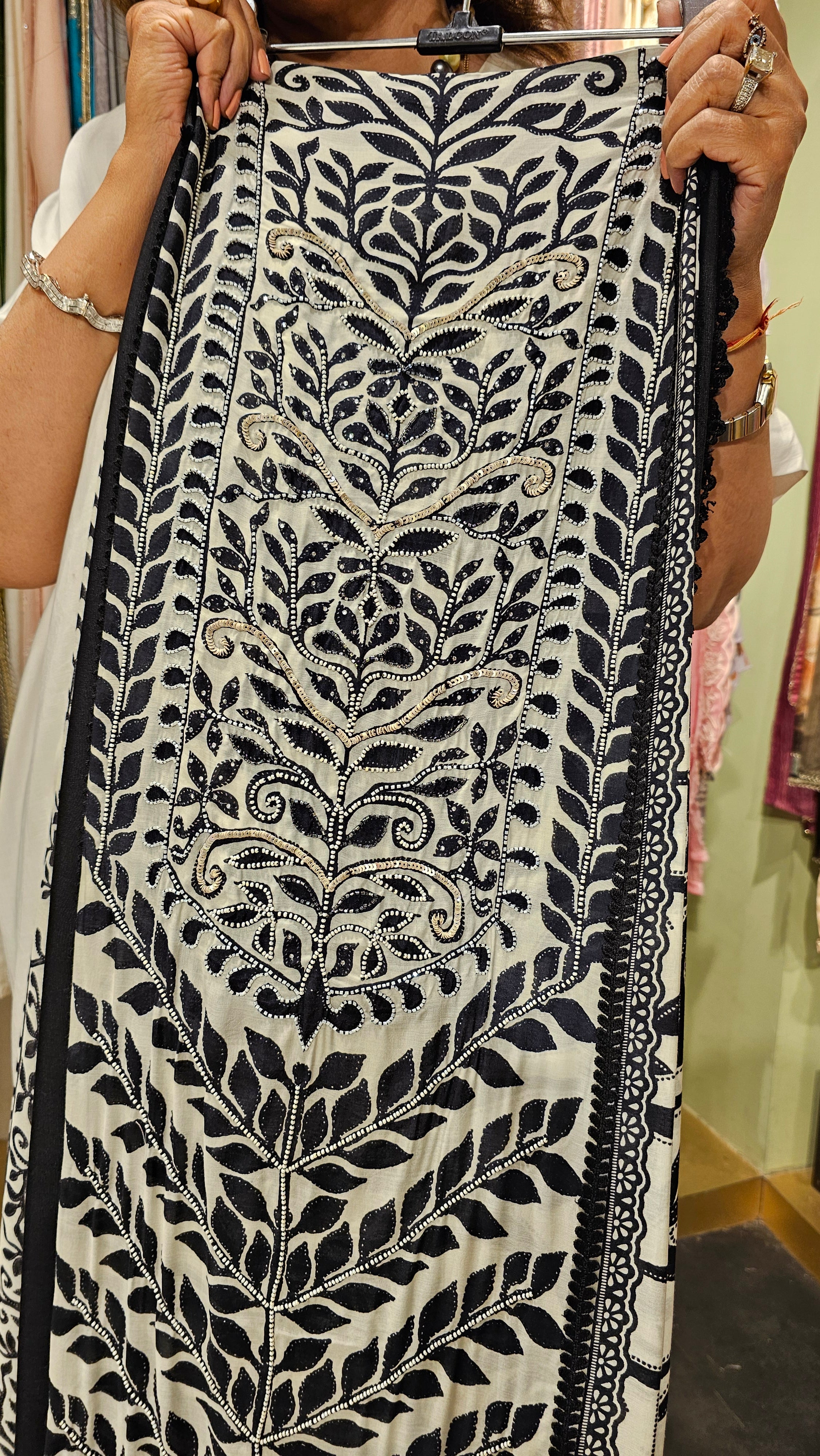 Beautiful Muslin Fabric Suit trimmed With Hand work