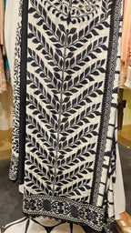 Beautiful Muslin Fabric Suit trimmed With Hand work