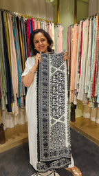 Beautiful Muslin Fabric Suit trimmed With Hand work