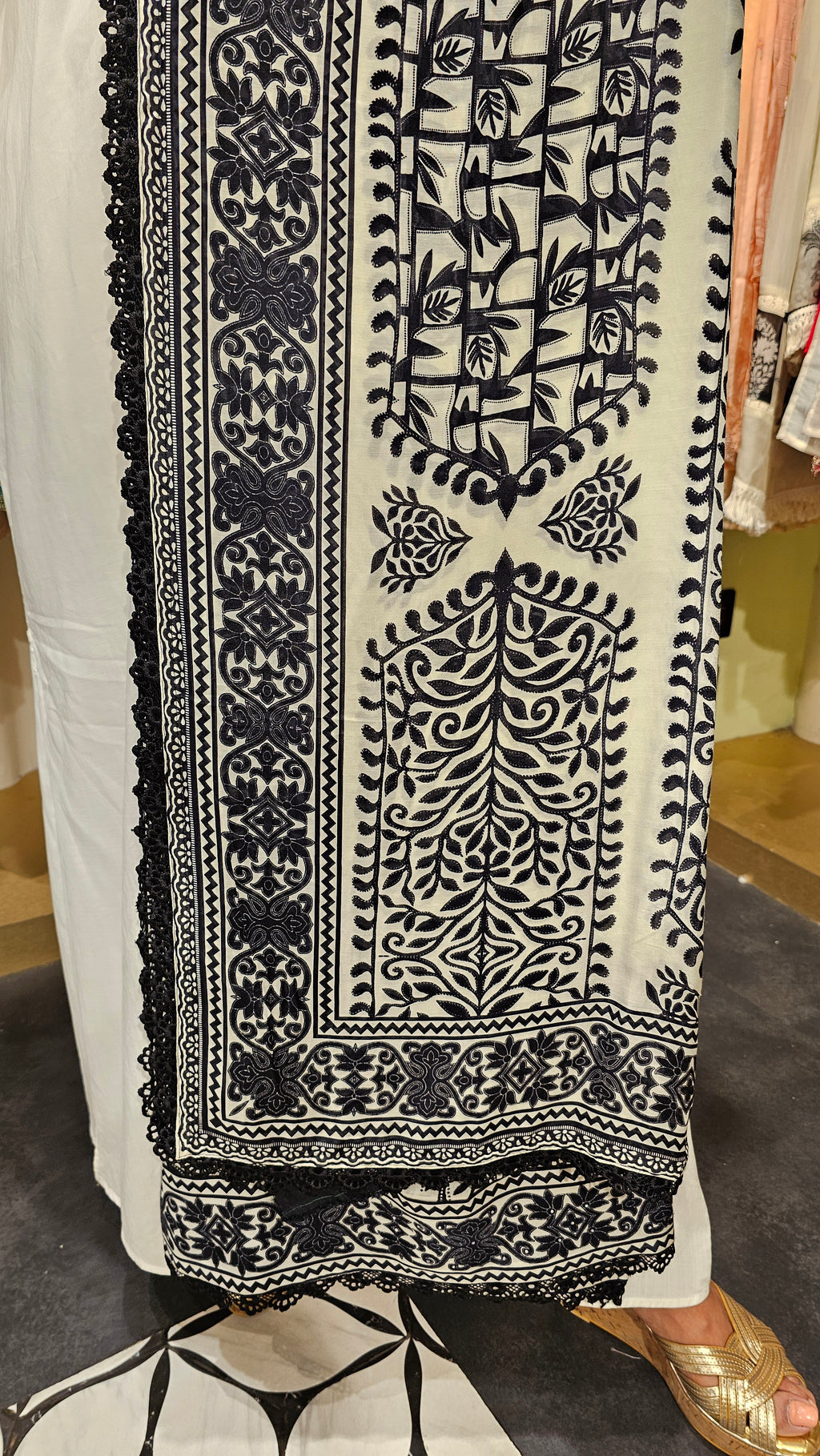 Beautiful Muslin Fabric Suit trimmed With Hand work
