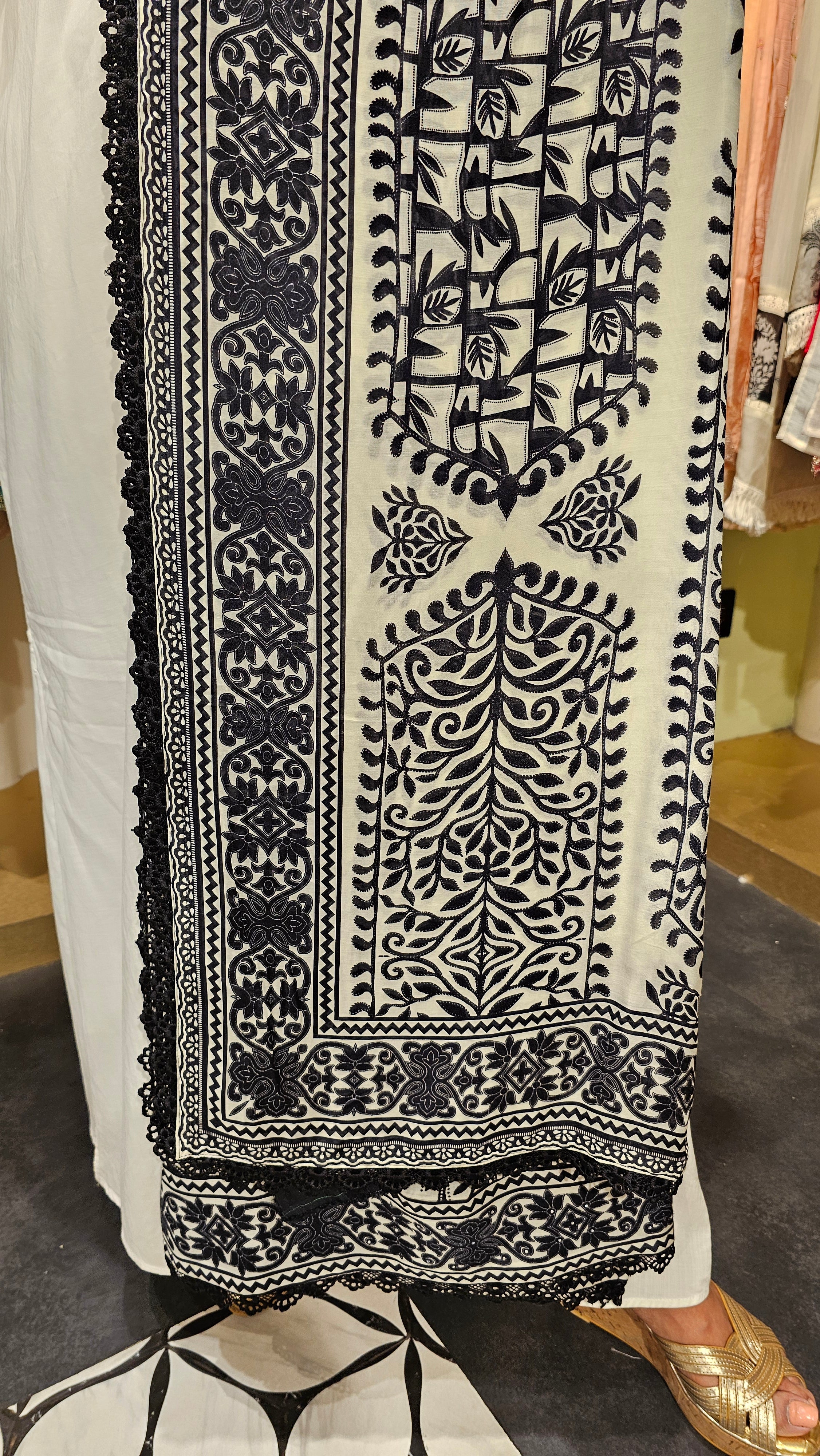 Beautiful Muslin Fabric Suit trimmed With Hand work