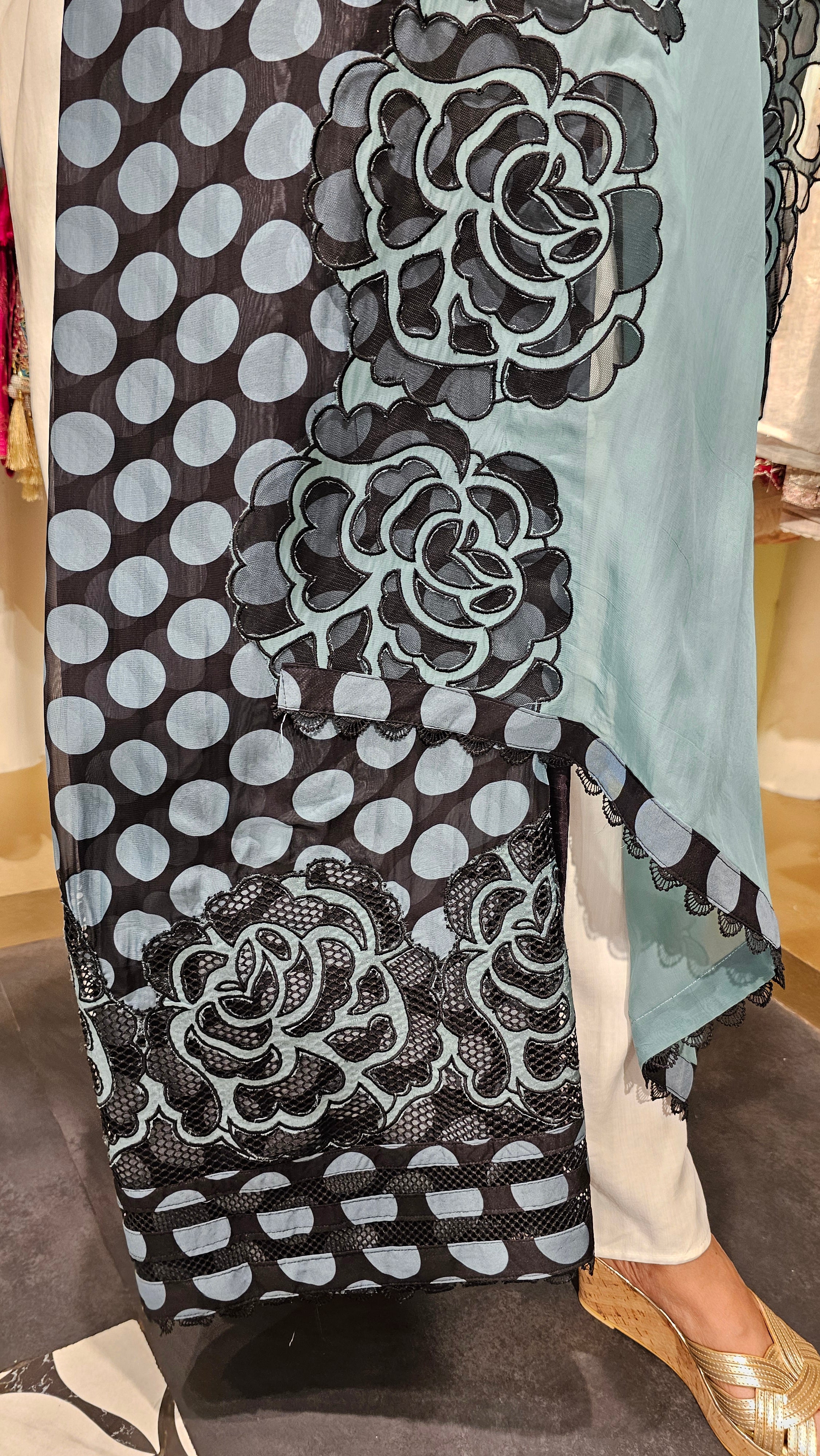 Beautiful Organza Fabric Suit trimmed With Floral Cut Work