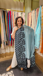 Beautiful Organza Fabric Suit trimmed With Floral Cut Work