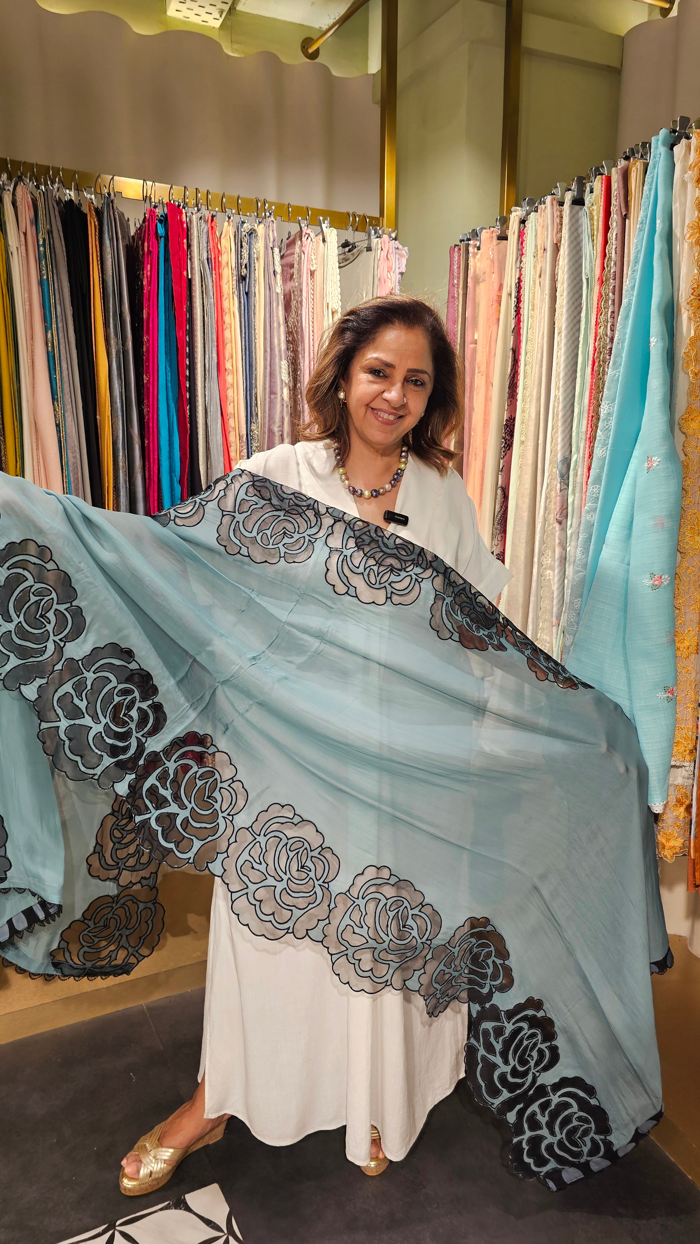 Beautiful Organza Fabric Suit trimmed With Floral Cut Work