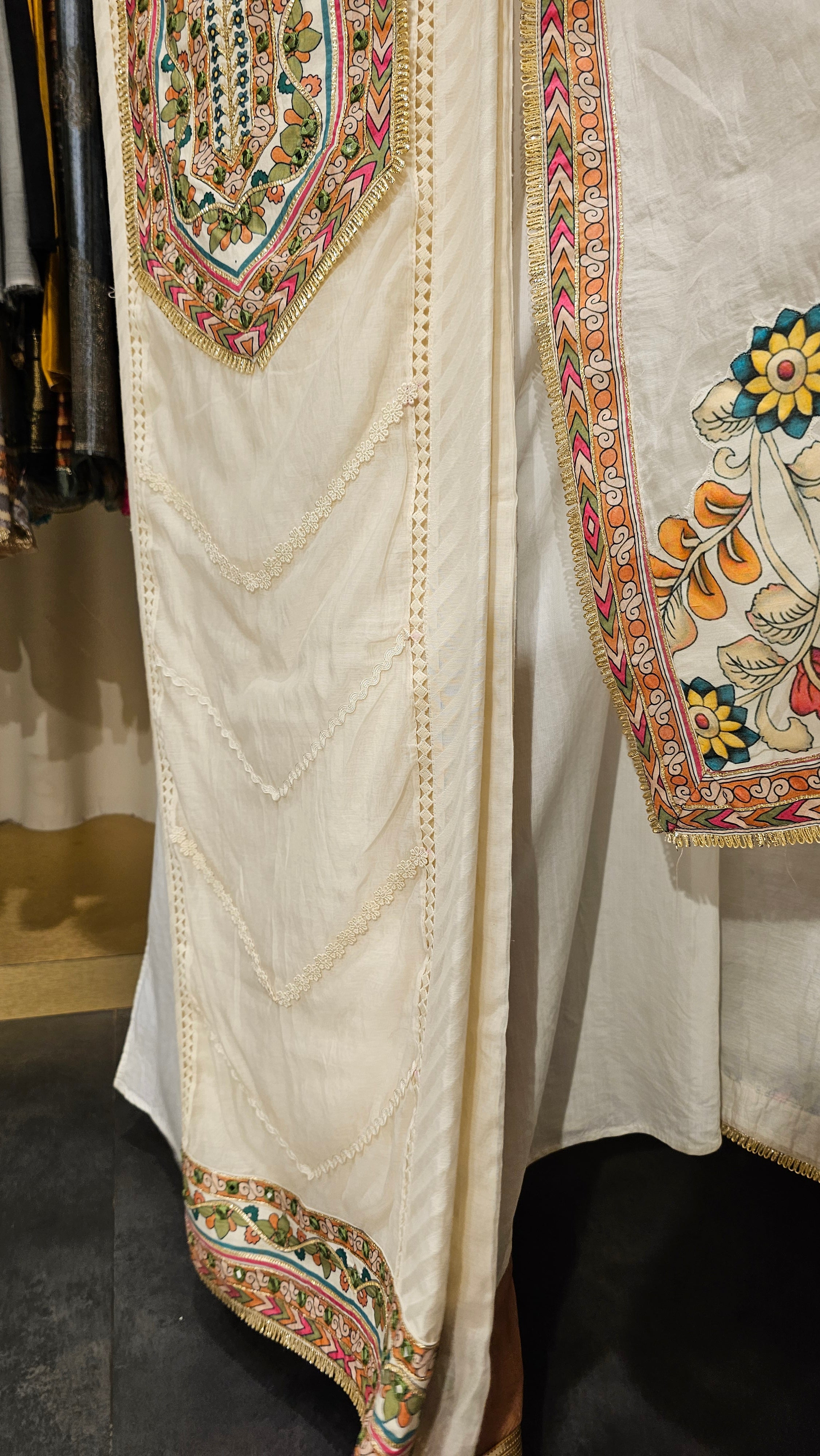 Beautiful Mul Fabric Suit trimmed With Gota & Kalamkari