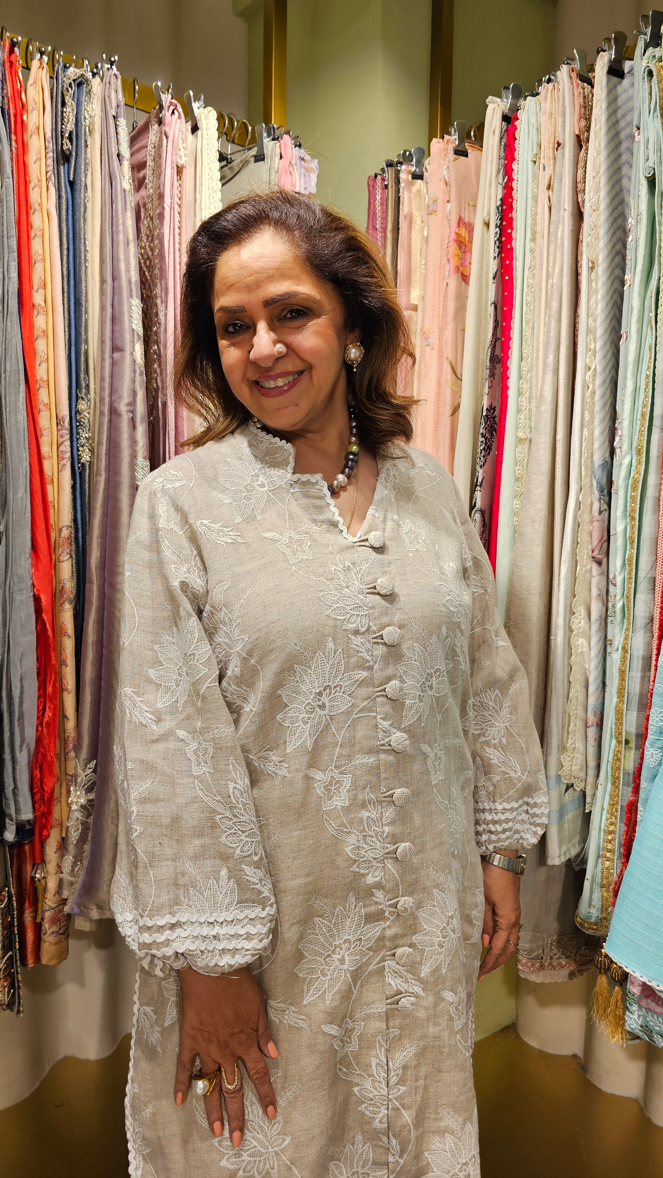 Cool and comfortable embroidered linen kurta dressed with dori work & laces with ivory linen pants with dori work