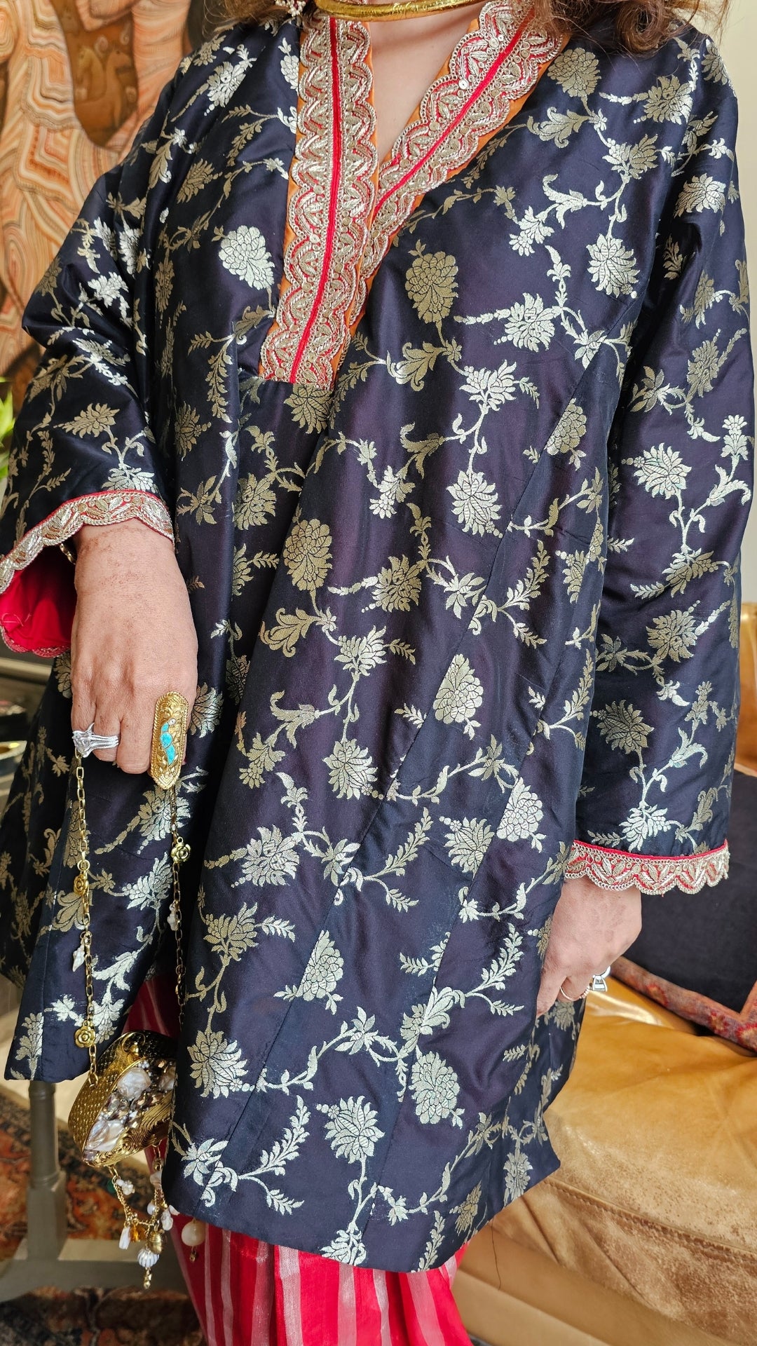 Fusion of Tissue and Banarasi Silk Kurta in Banarasi Silk Jaal With Silk Tissue Bottom in Contrasting Red With Embroidered Poncha