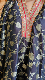 Fusion of Tissue and Banarasi Silk Kurta in Banarasi Silk Jaal With Silk Tissue Bottom in Contrasting Red With Embroidered Poncha