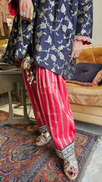 Fusion of Tissue and Banarasi Silk Kurta in Banarasi Silk Jaal With Silk Tissue Bottom in Contrasting Red With Embroidered Poncha