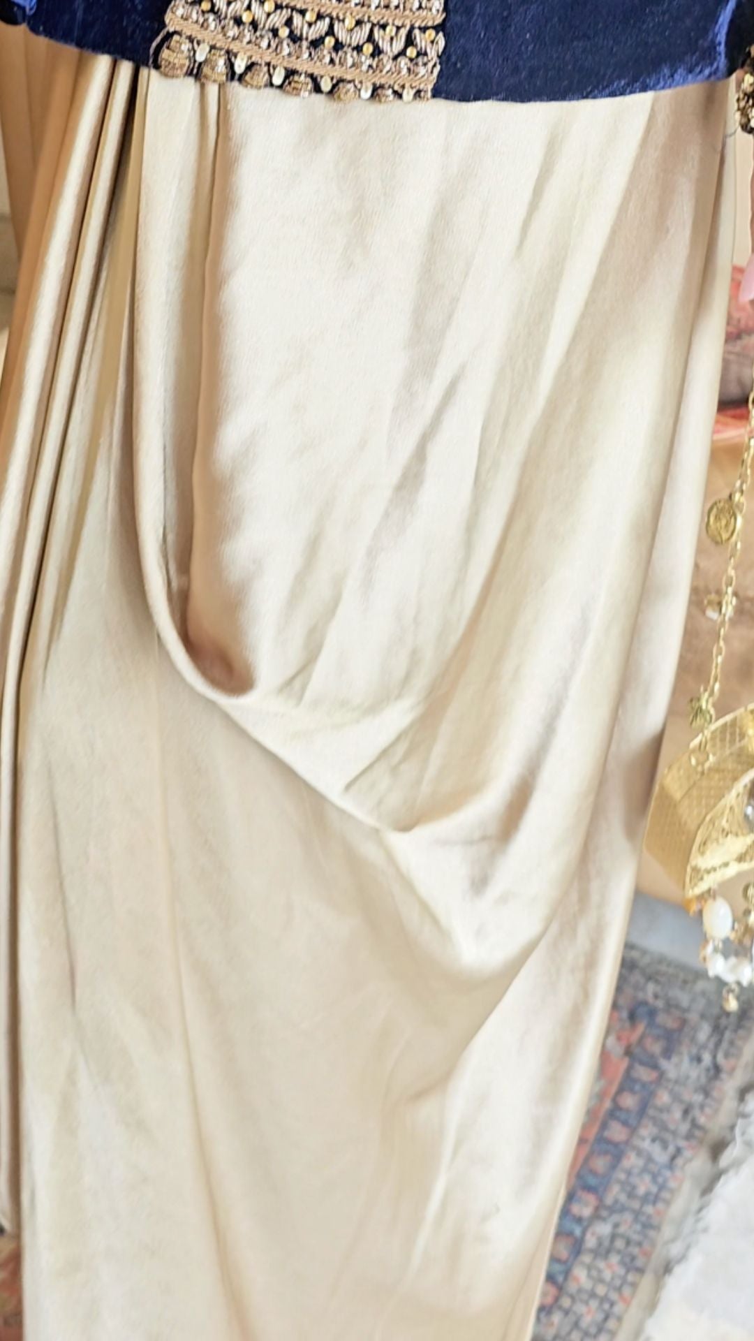 A beautiful velvet hand embroidered Zardozi jacket with satin drape skirt